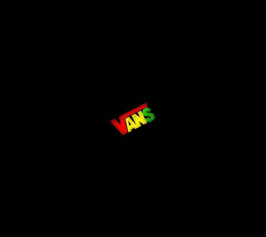 Vans 桌布 壁紙 — 紅、黃、綠色的Vans標誌在純黑色背景上格外突出。