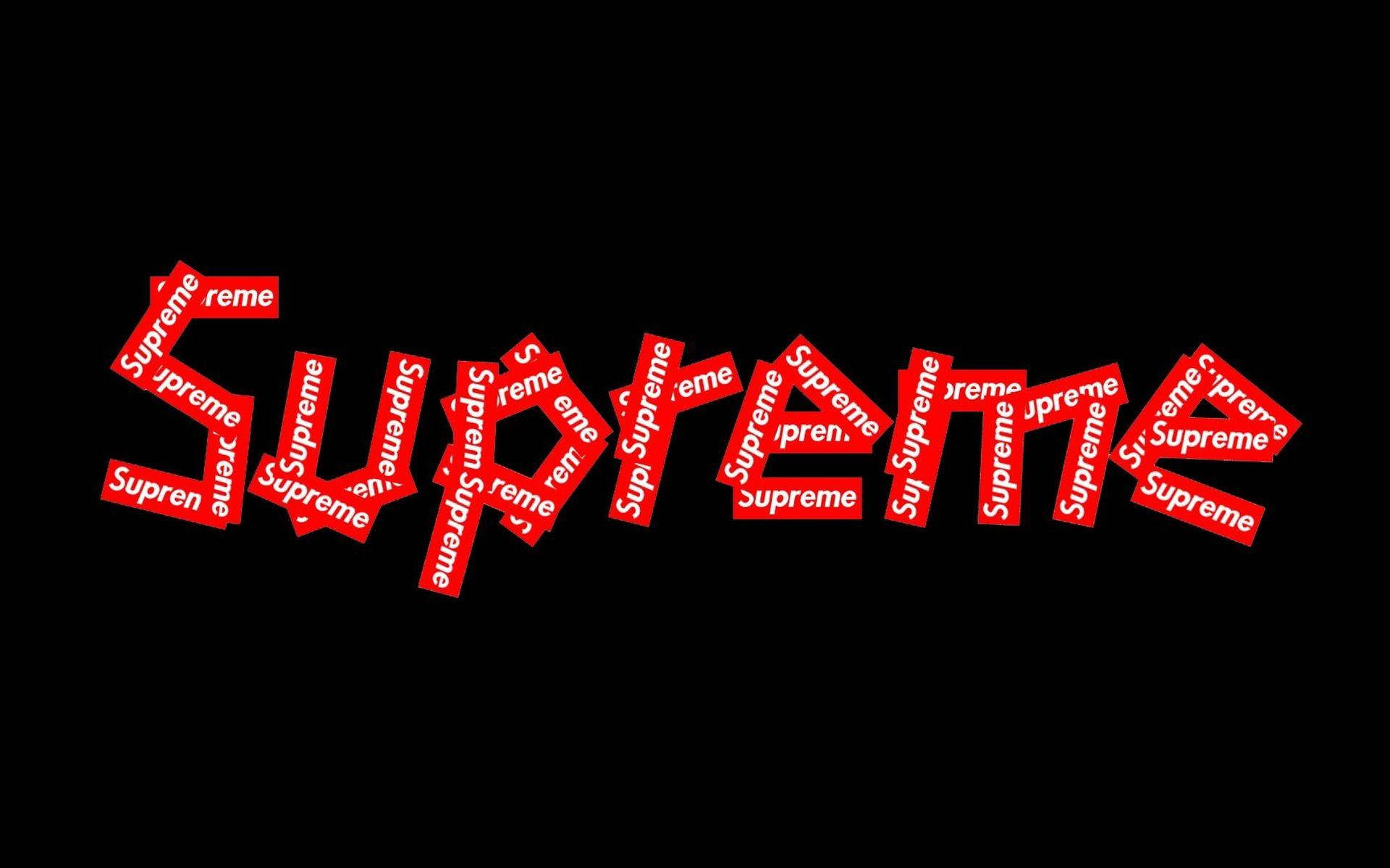 supreme 桌布 壁紙 — 紅色 Supreme 標誌碎片化重疊在鮮明的黑色背景上，呈現大膽的圖形設計。