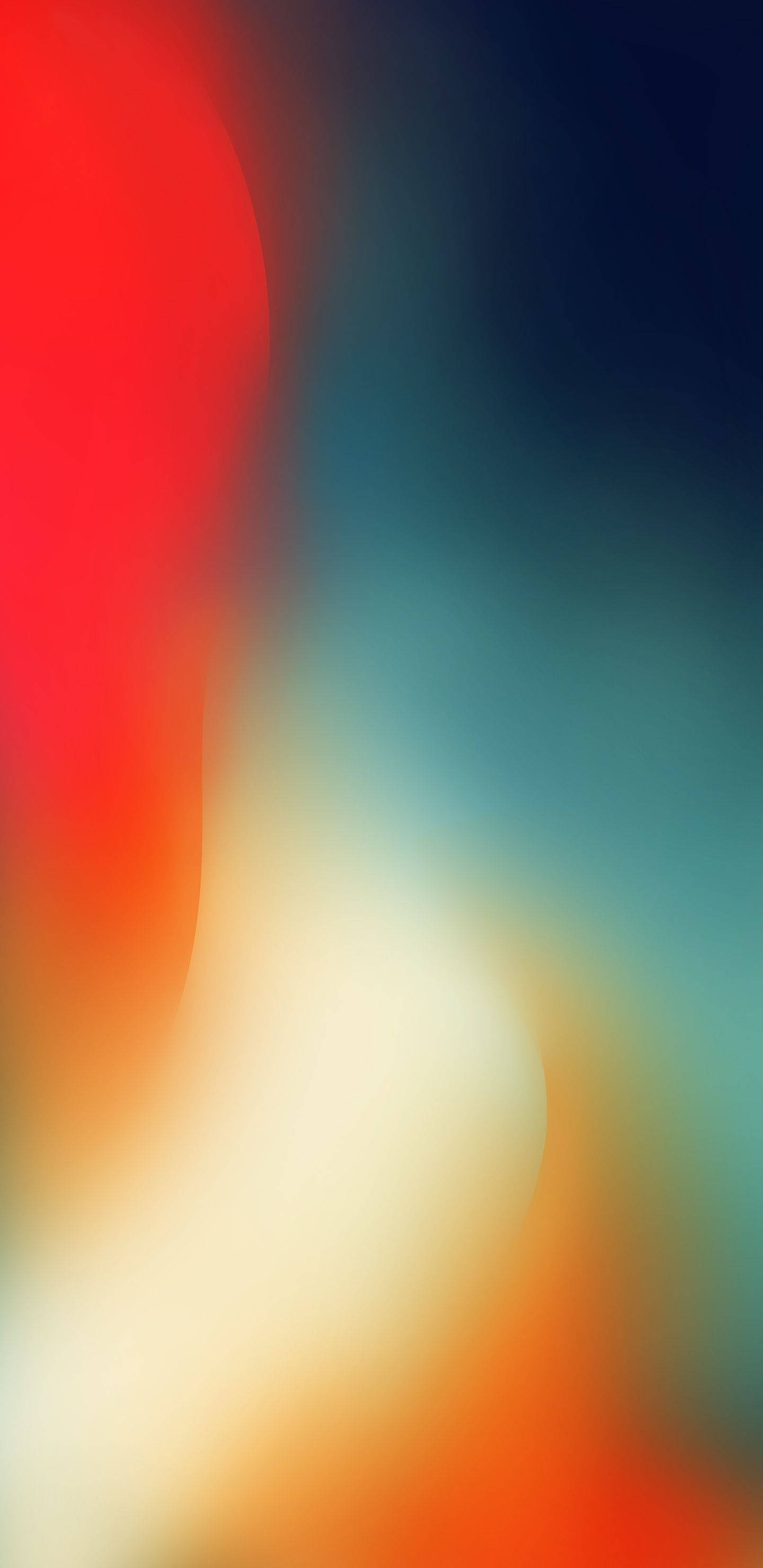 Simple iPhone 桌布 壁紙 — 紅色、橙色、黃色和青色融合成柔和漸變的鮮豔抽象模糊效果。