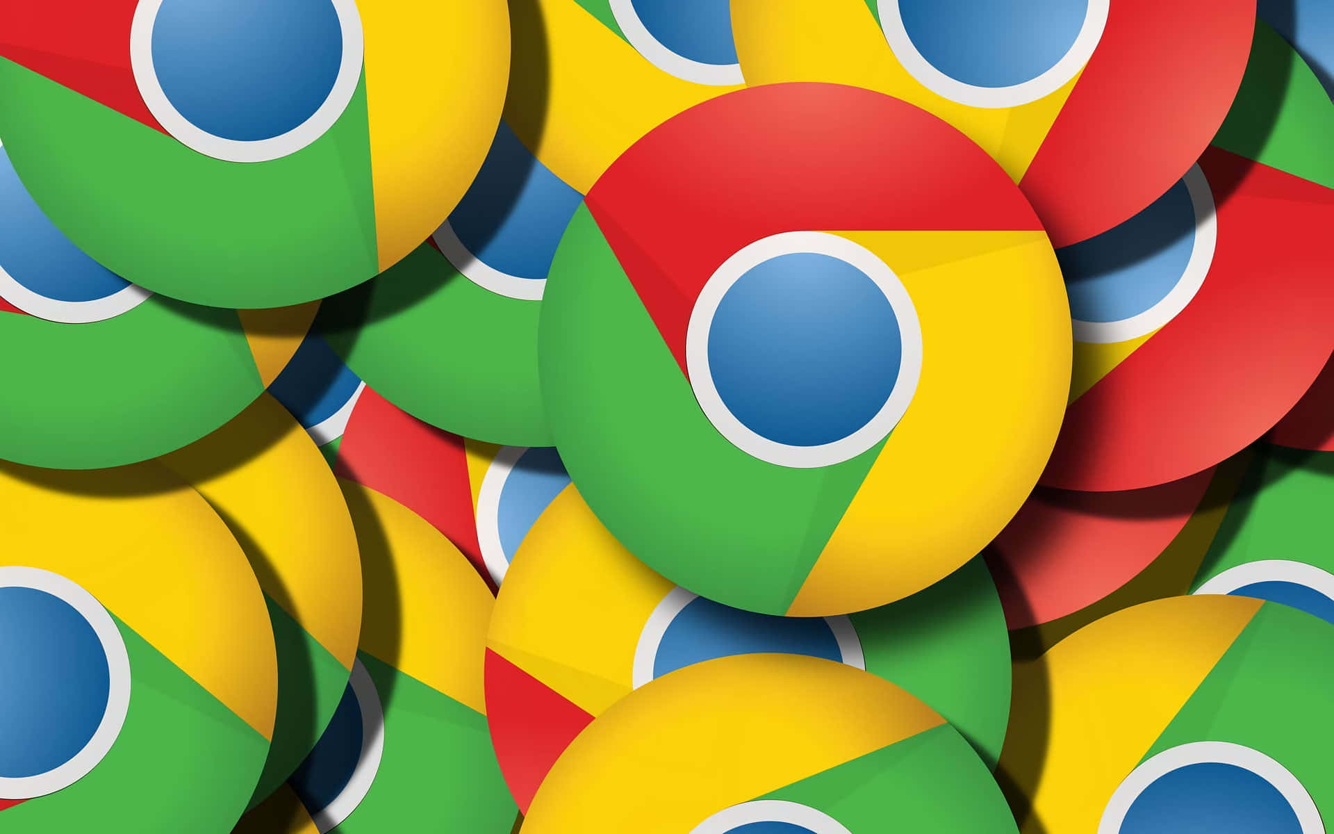 Google Chrome 桌布 壁紙 — 紅色、黃色、綠色和藍色的Google Chrome標誌重疊在一起的鮮明特寫，帶有柔和陰影。