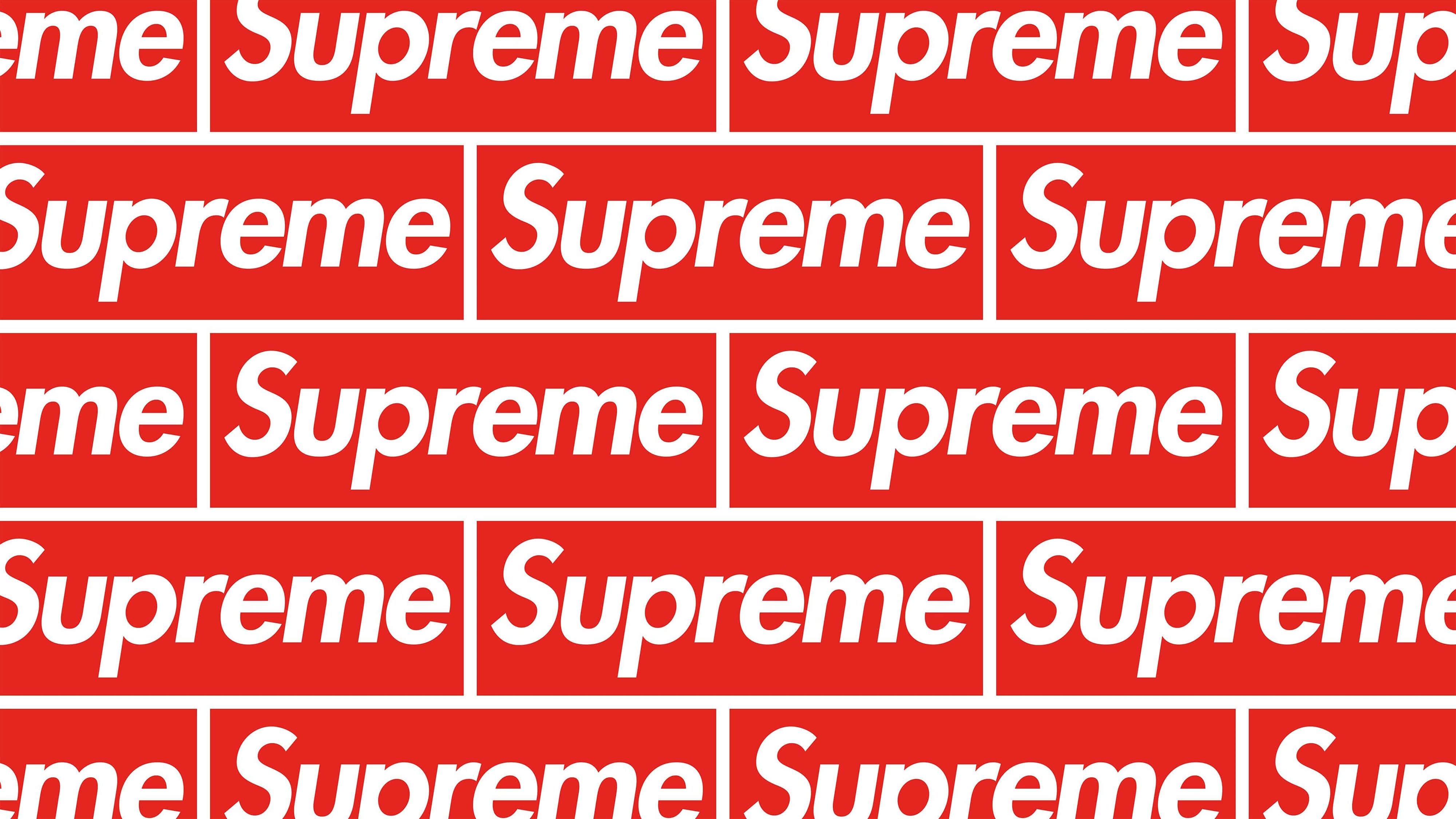 supreme aesthetic 桌布 壁紙 — 紅色和白色的Supreme標誌瓷磚在整個壁紙上形成大膽的重複圖案。