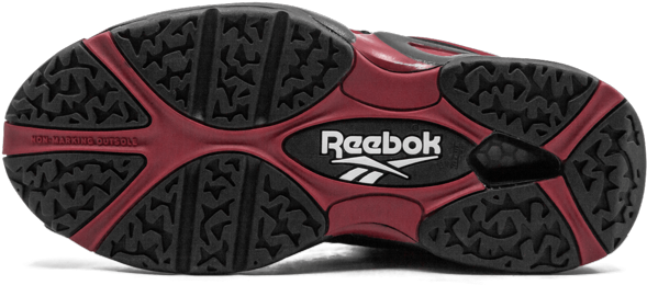 銳步 桌布 壁紙 — 紅色和黑色 Reebok 運動鞋鞋底的近距離特寫，顯示帶有紋理的鞋底花紋和品牌標誌。