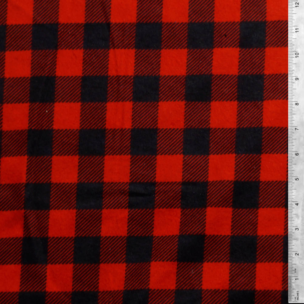 Plaid 桌布 壁紙 — 紅色和黑色水牛格紋布料的特寫，帶有對角編織線和右邊緣的尺子。