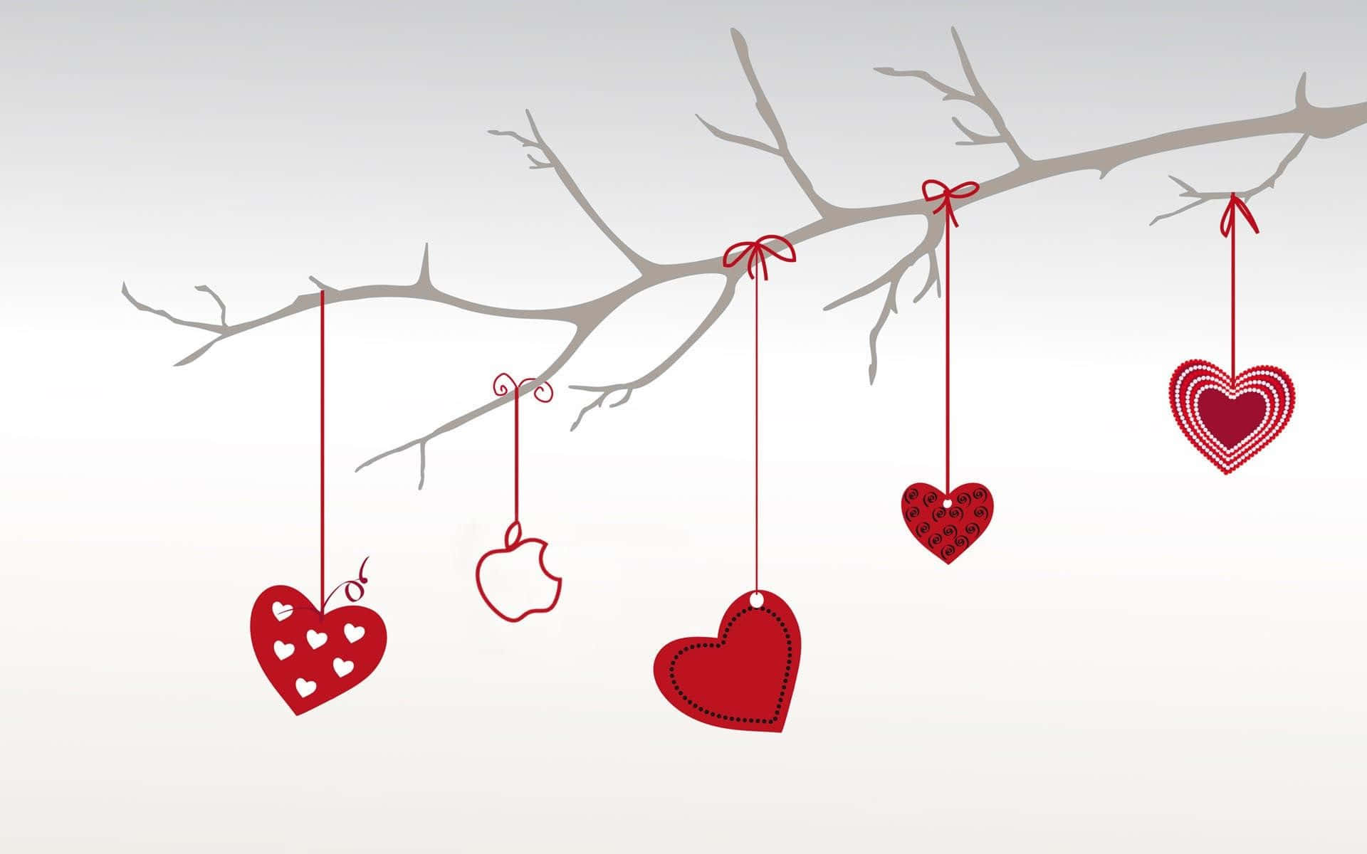 Valentines 桌布 壁紙 — 紅色心形裝飾和Apple標誌掛在光禿禿的樹枝上，背景是柔和的灰色。