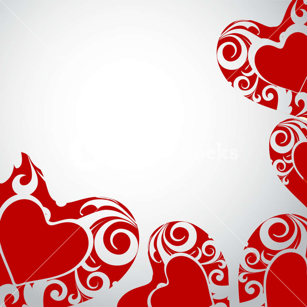valentine 桌布 壁紙 — 紅色華麗心形，帶有旋轉的白色圖案，框住淺灰色背景的角落。