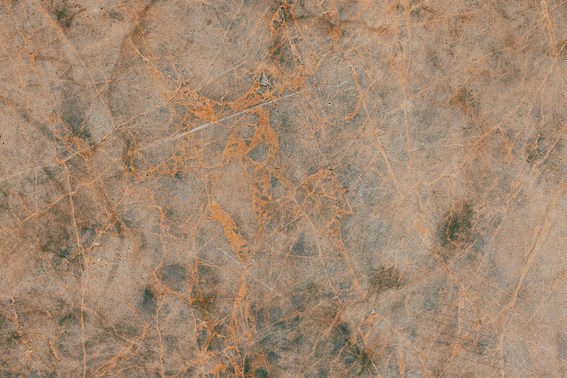 Marble Desktop 桌布 壁紙 — 紋理石面特寫，帶有漩渦狀棕色和灰色紋理，類似天然大理石或老化混凝土。