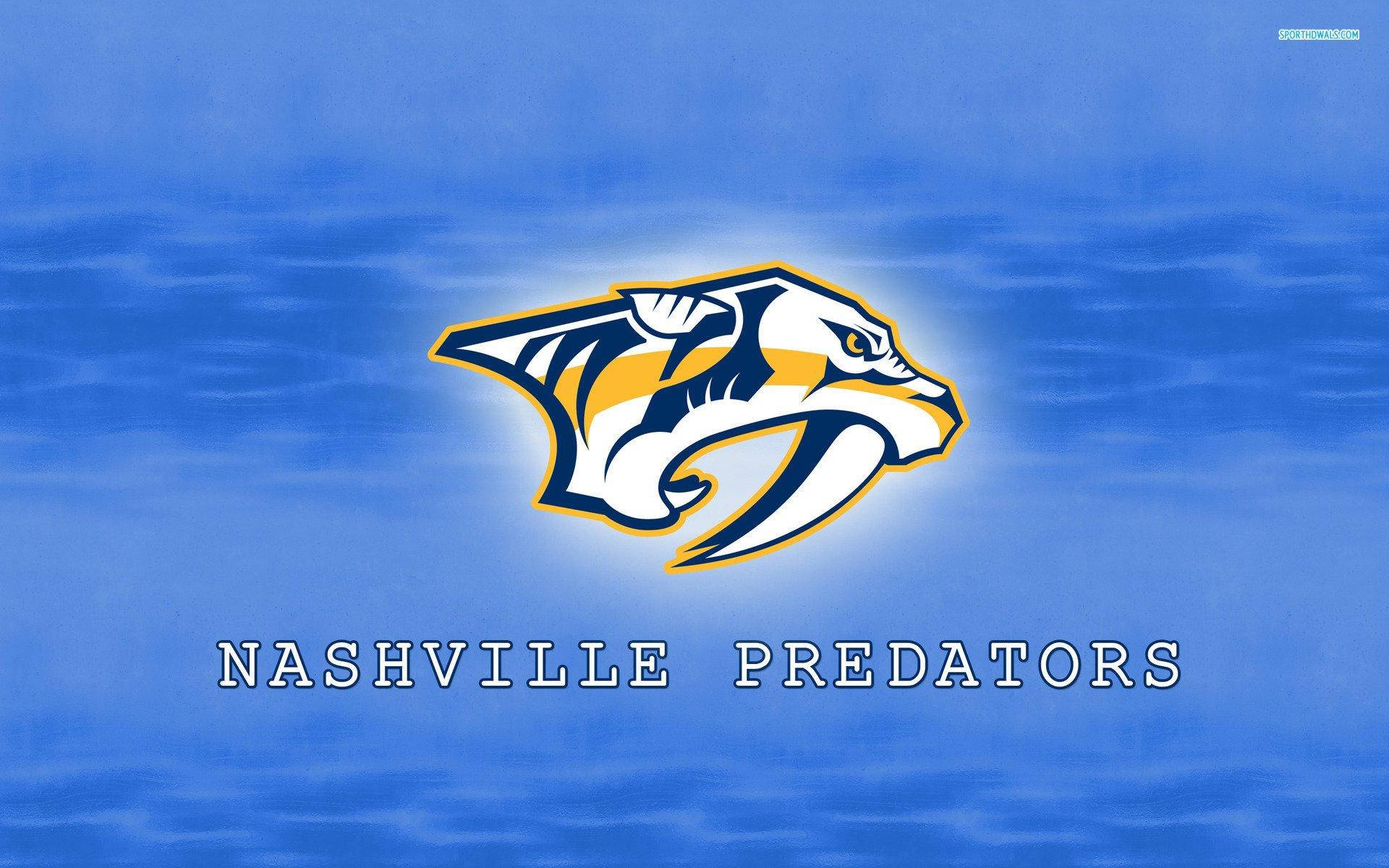 Predators 桌布 壁紙 — 納什維爾掠奪者隊標誌在帶紋理的藍色背景上發光，下方有球隊名稱。