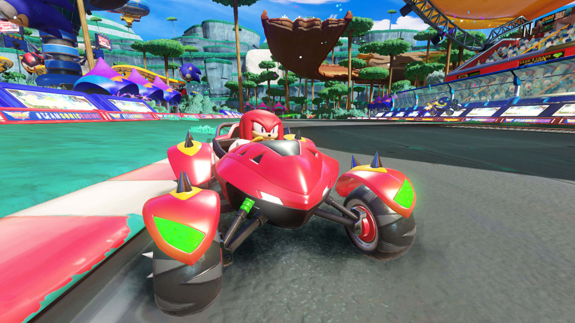 Sonic Battle Racers 桌布 壁紙 — 納克魯斯駕駛紅色尖刺卡丁車，在充滿活力的卡通賽道上奔馳，周圍有歡呼的人群和漂浮島嶼。