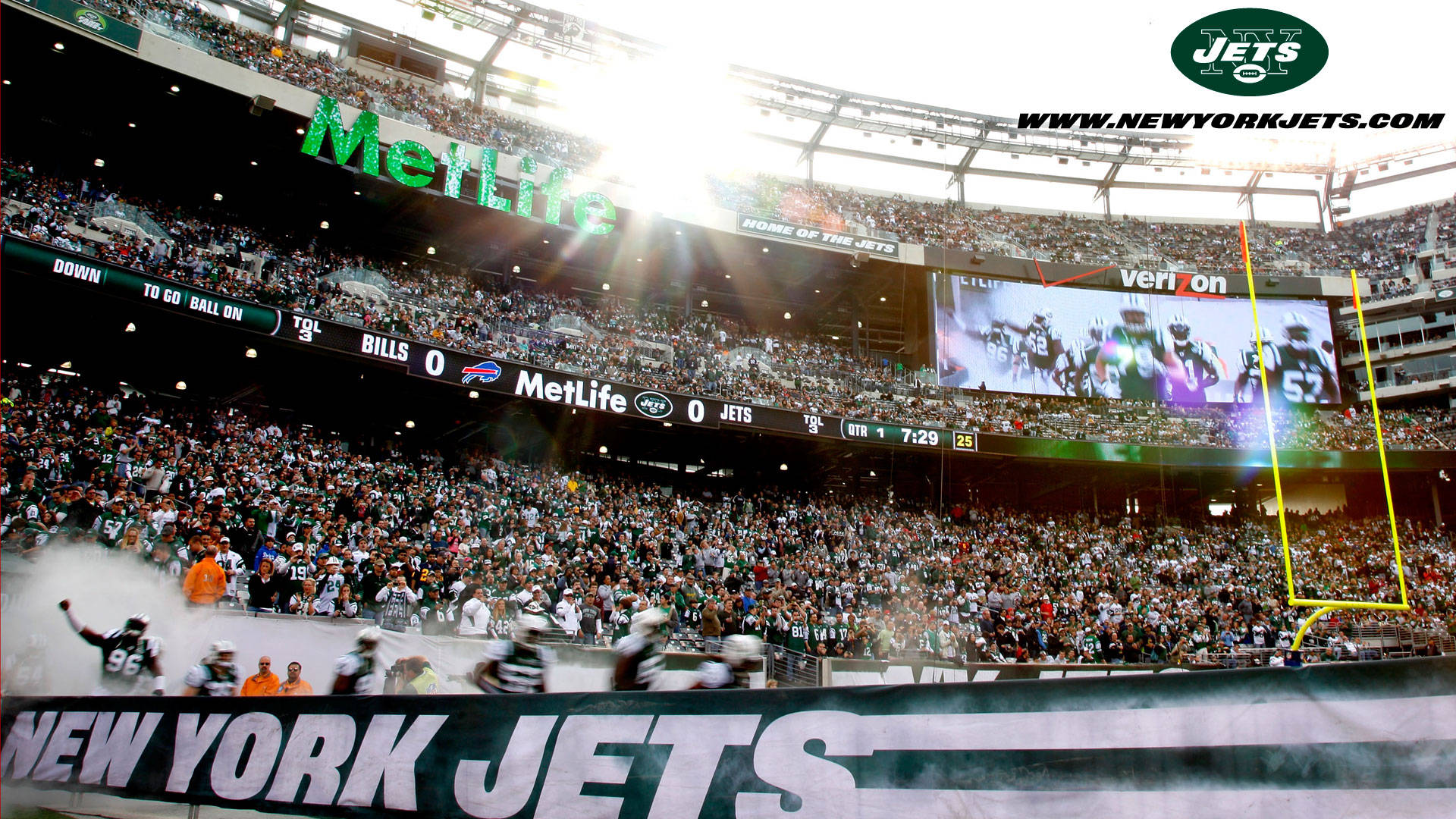 Ny Jets 桌布 壁紙 — 紐約噴射機隊比賽期間，明亮的陽光和歡呼的球迷擠滿了大都會人壽體育場。