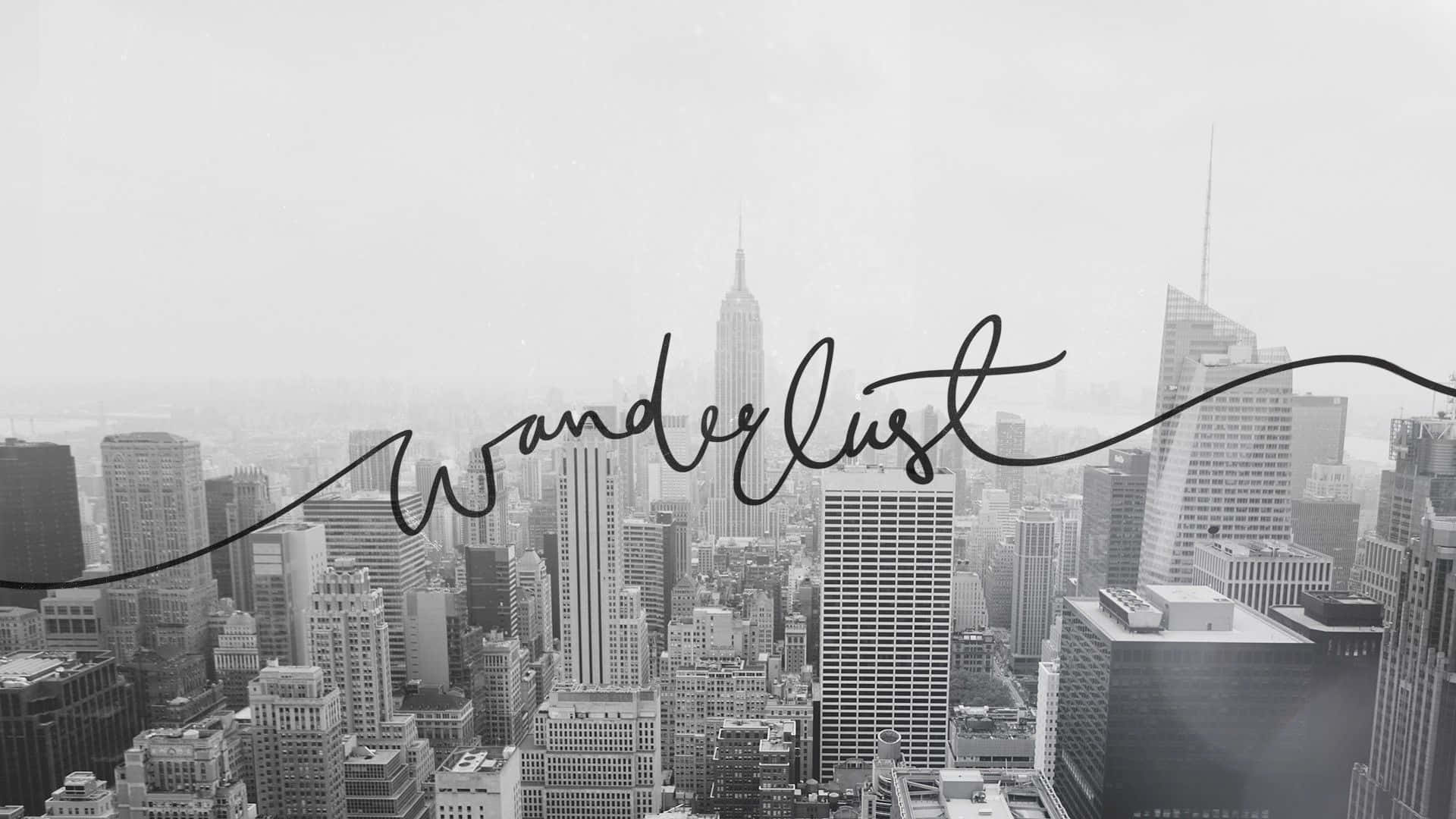 wanderlust 桌布 壁紙 — 紐約天際線的單色城市景觀，帶有'Wanderlust'字體疊加，喚起旅行夢想。