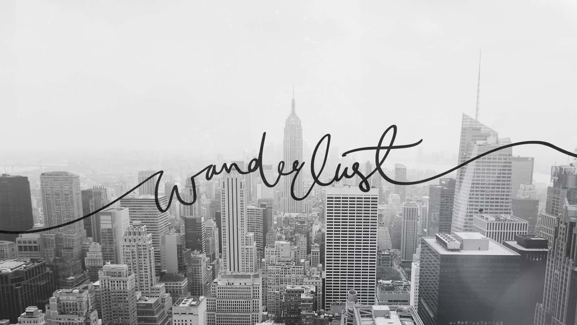 Life Aesthetic 桌布 壁紙 — 紐約天際線的黑白城市景觀，帶有「Wanderlust」文字疊加，喚起旅行夢想。