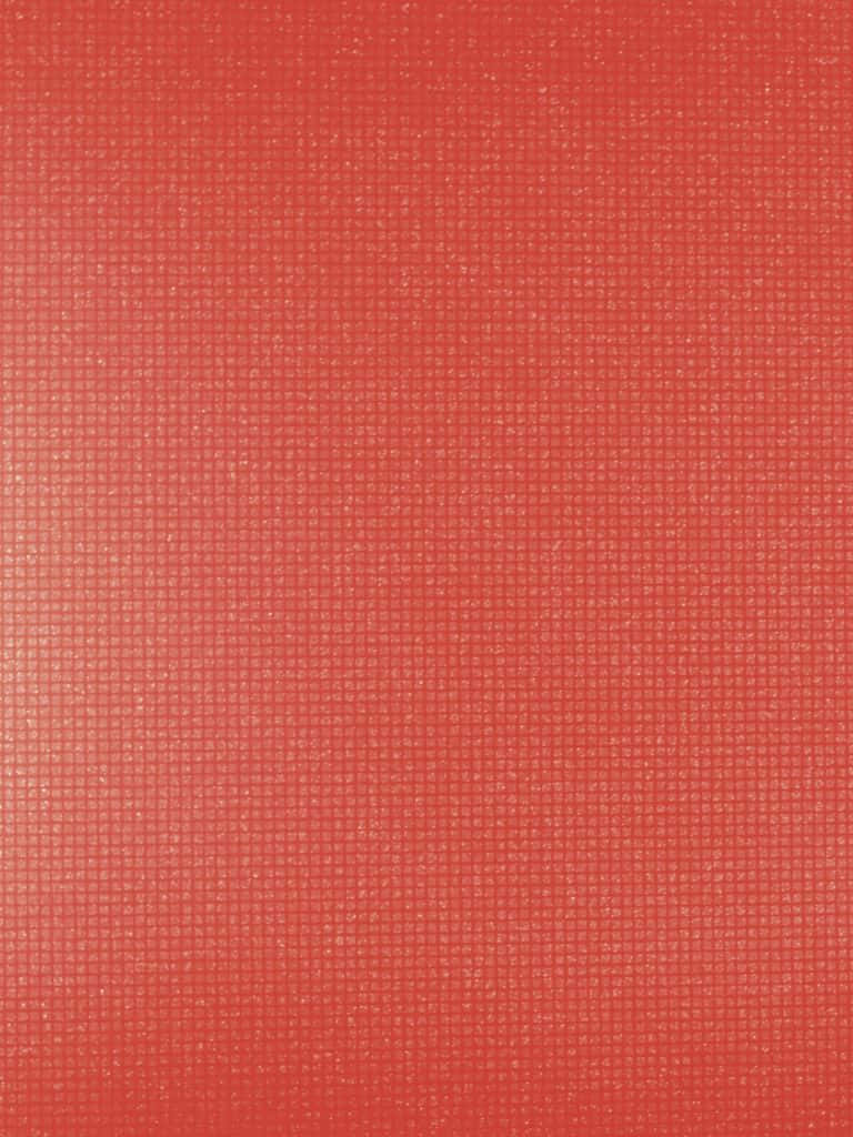 768x1024 桌布 壁紙 — 純珊瑚紅色表面，帶有微妙的網格紋理和整體淡淡的斑點。