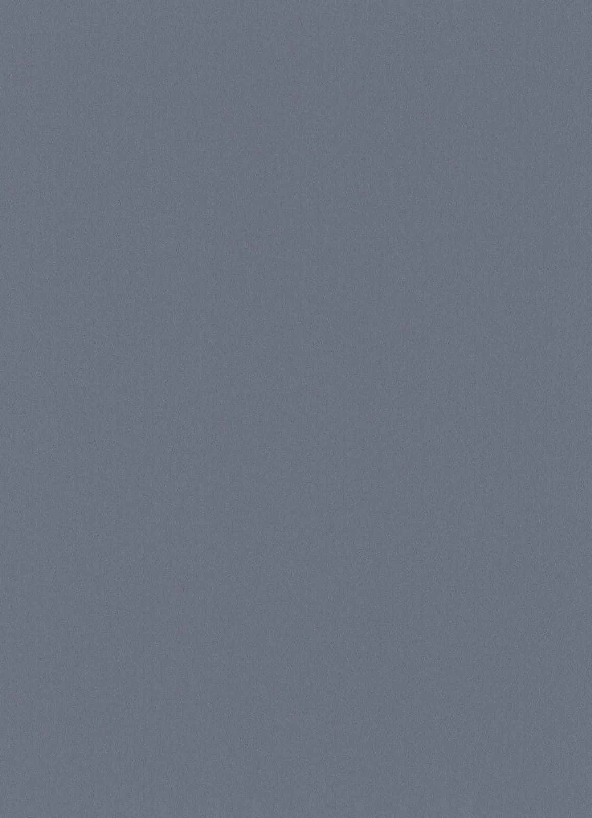 Grey Blue 桌布 壁紙 — 純色柔和藍灰色背景，帶有細微紋理，沒有可見的物體或圖案。