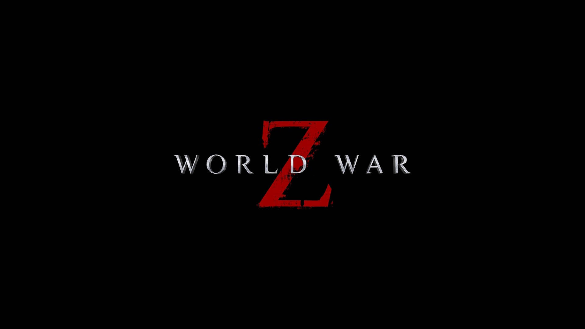 World 桌布 壁紙 — 純黑背景上，以血紅色風格化Z字和金屬銀色文字展示標題「WORLD WAR Z」。