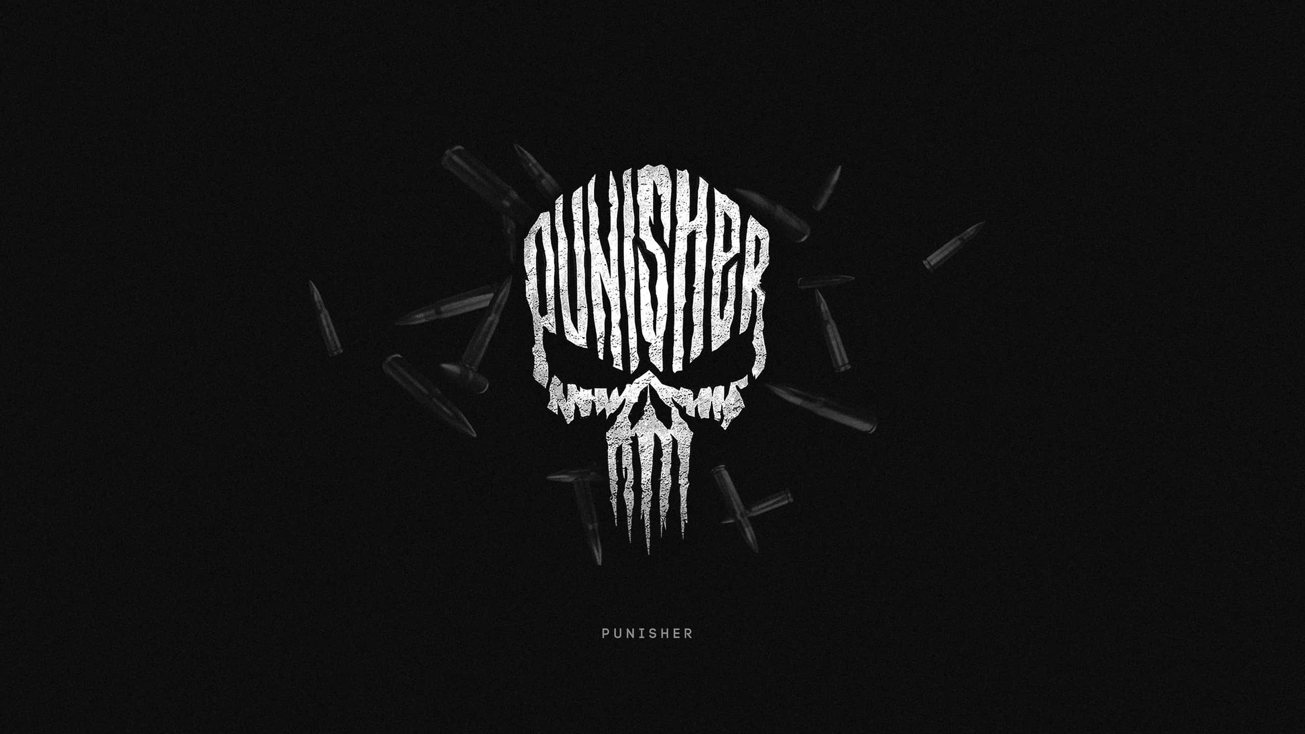 Punisher Desktop 桌布 壁紙 — 純黑色背景上，一個帶有向外輻射彈殼的白色 Punisher 骷髏標誌。