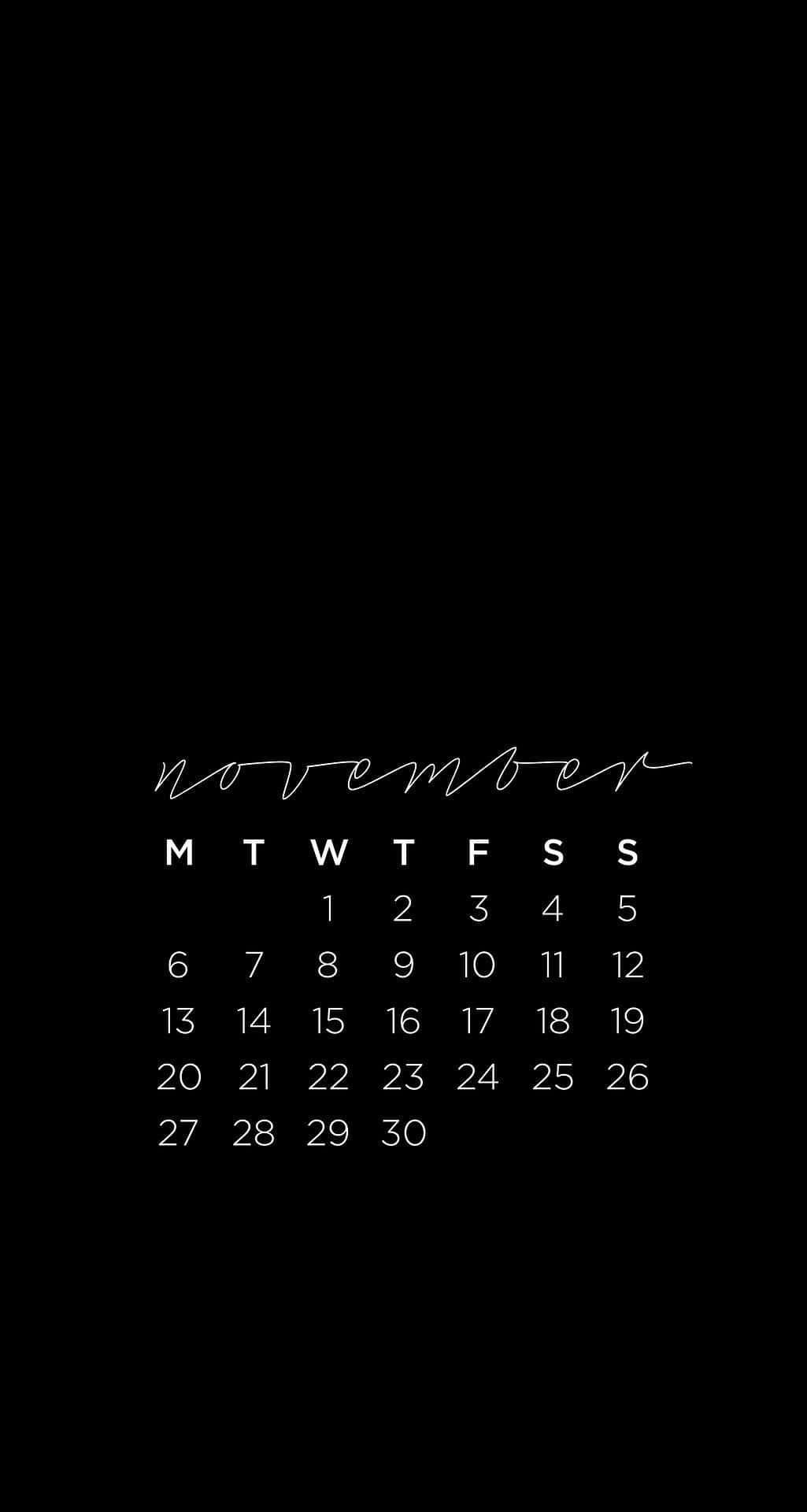 Minimalist Phone 桌布 壁紙 — 純黑色背景上以白色手寫體和方塊字體呈現的簡約十一月日曆。