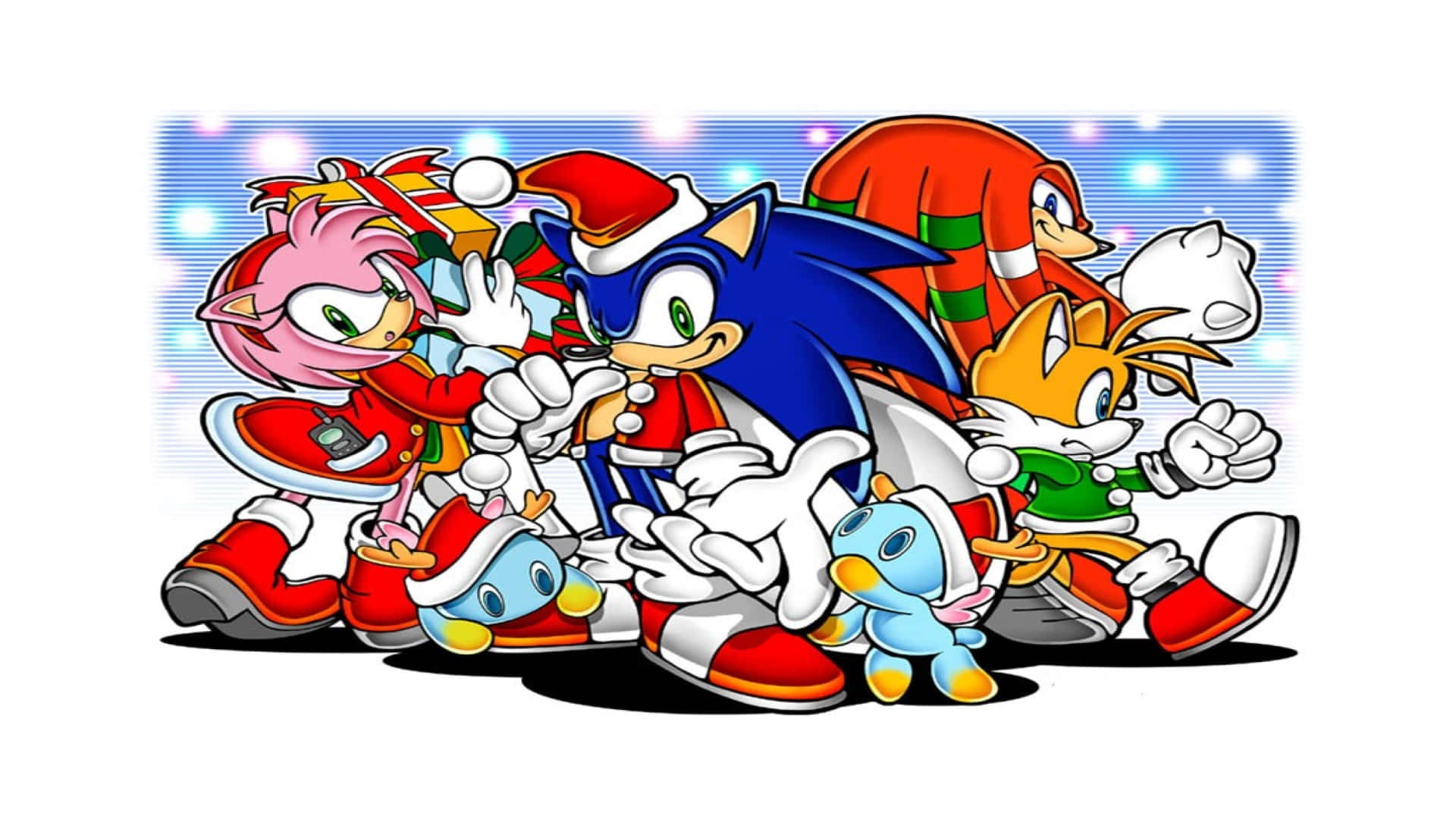 Sonic Adventure HD 桌布 壁紙 — 索尼克和朋友們穿著節日服裝，在閃閃發光的藍色背景上歡快地奔跑。