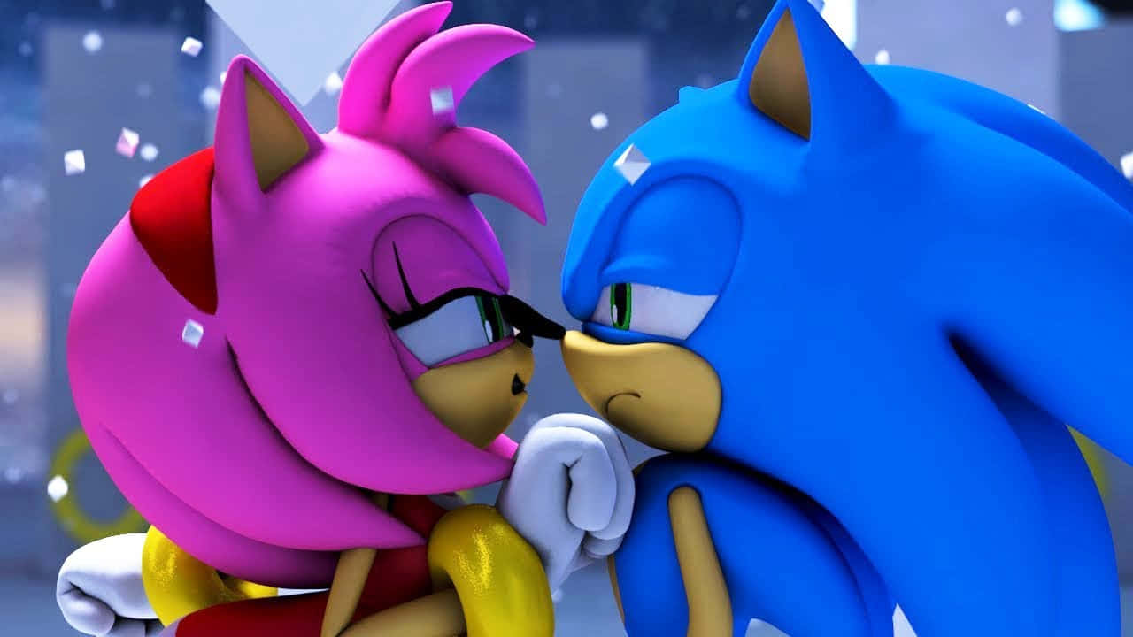 Sonic And Amy 桌布 壁紙 — 索尼克和艾米·羅斯在充滿活力的動畫場景中，共享親密時刻，五彩紙屑在他們周圍飄落。