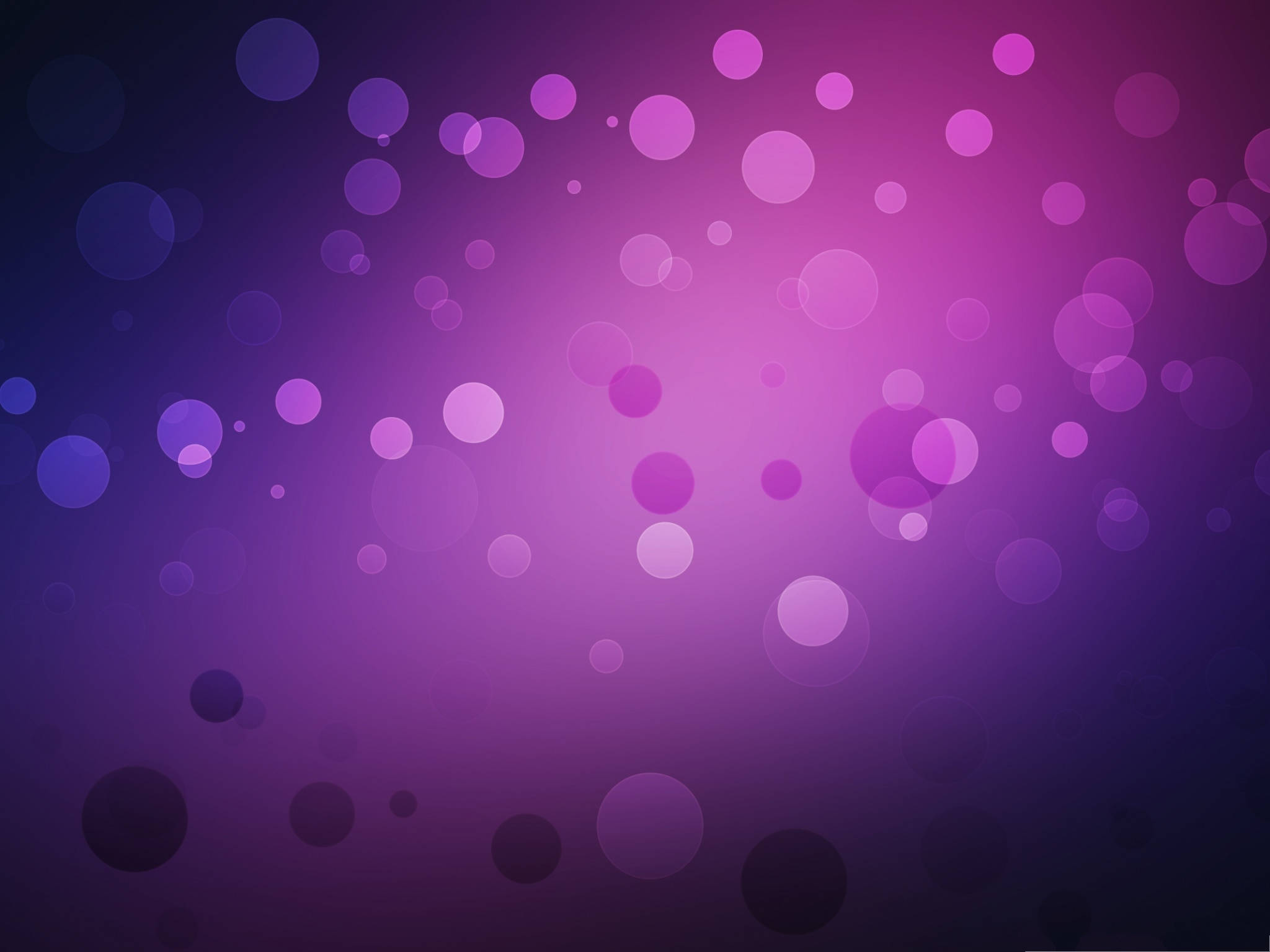 Violet 桌布 壁紙 — 紫色漸層背景，散落著發光的散景圓圈，營造出夢幻般的抽象效果。