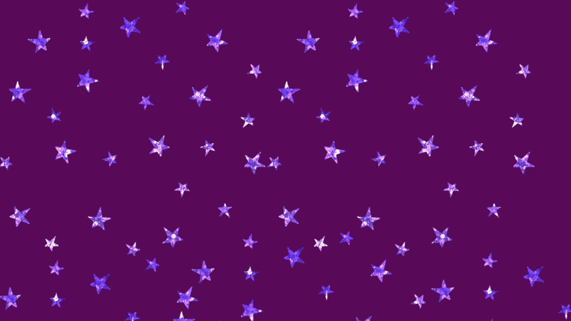Purple Sparkle 桌布 壁紙 — 紫色背景點綴著散落的發光藍色星星，營造出神奇的天體圖案。