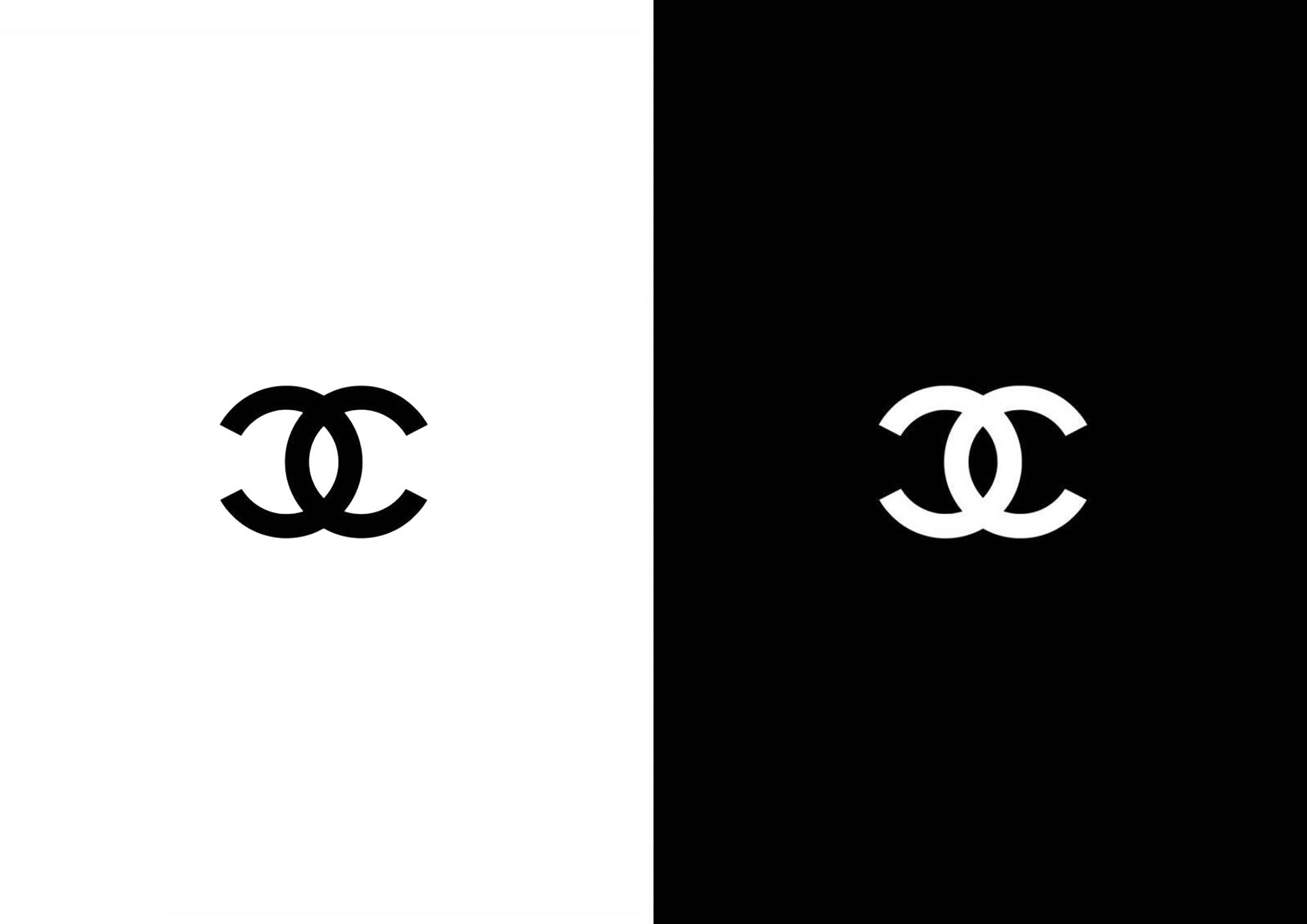 香奈兒標誌 桌布 壁紙 — 經典 Chanel 標誌以黑底白字和白底黑字顯示，營造高對比度的極簡品牌形象。