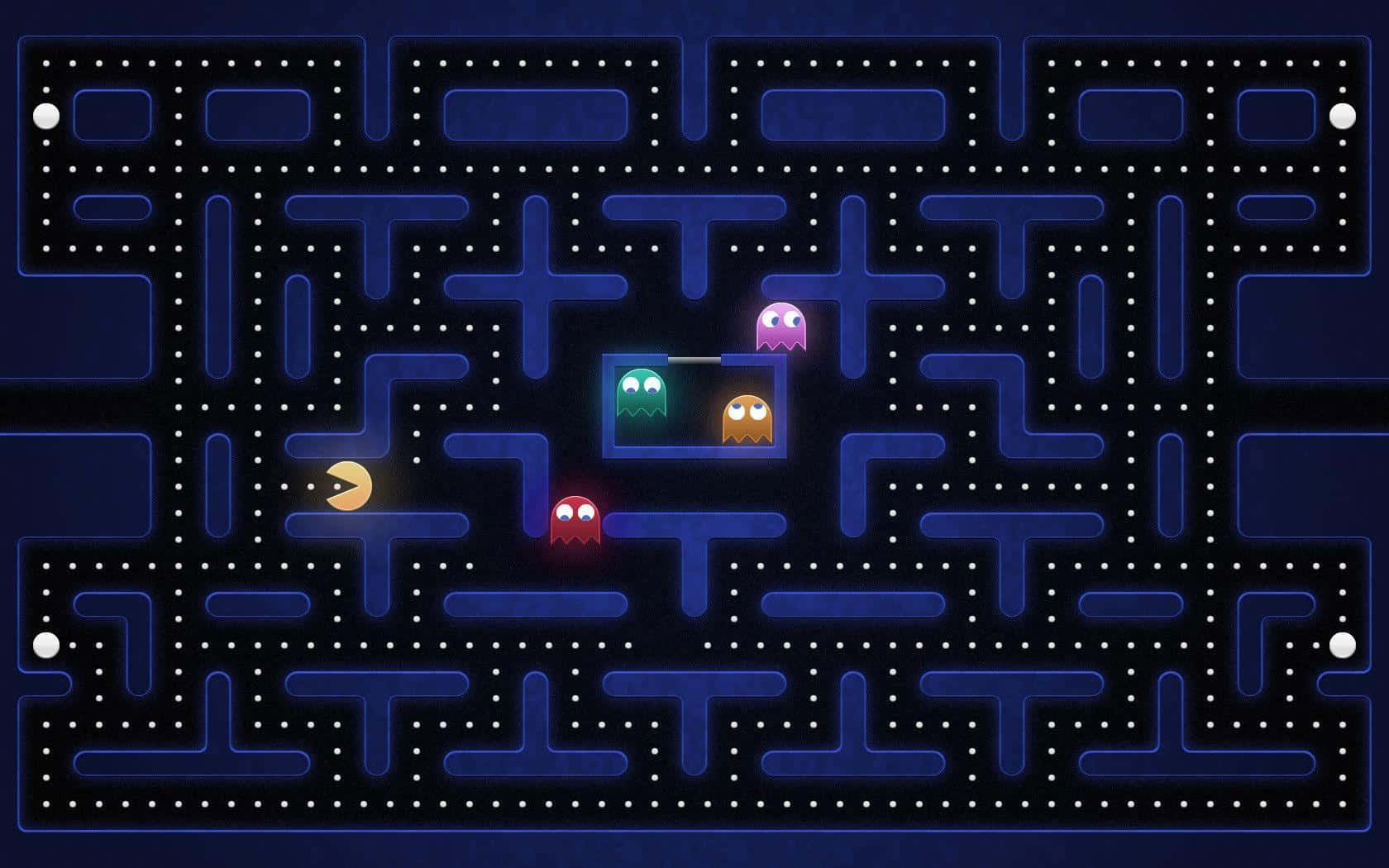 Pacman 桌布 壁紙 — 經典 Pacman 遊戲場景，黃色 Pacman 在發光藍色迷宮中追逐四個彩色鬼魂。