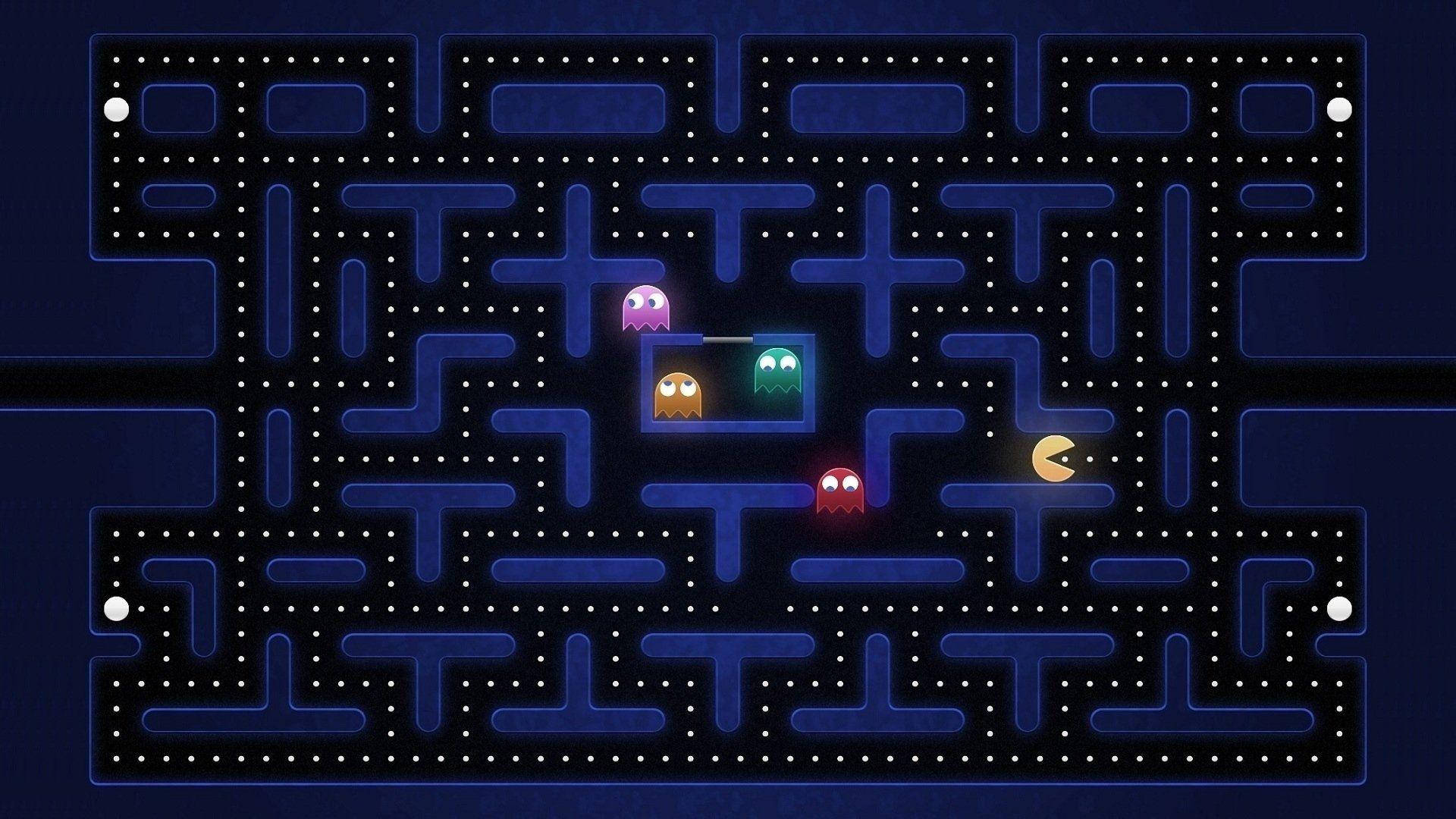 Pacman 在帶有發光小點的復古街機遊戲迷宮中追逐鬼魂。 — 黑屏 壁紙