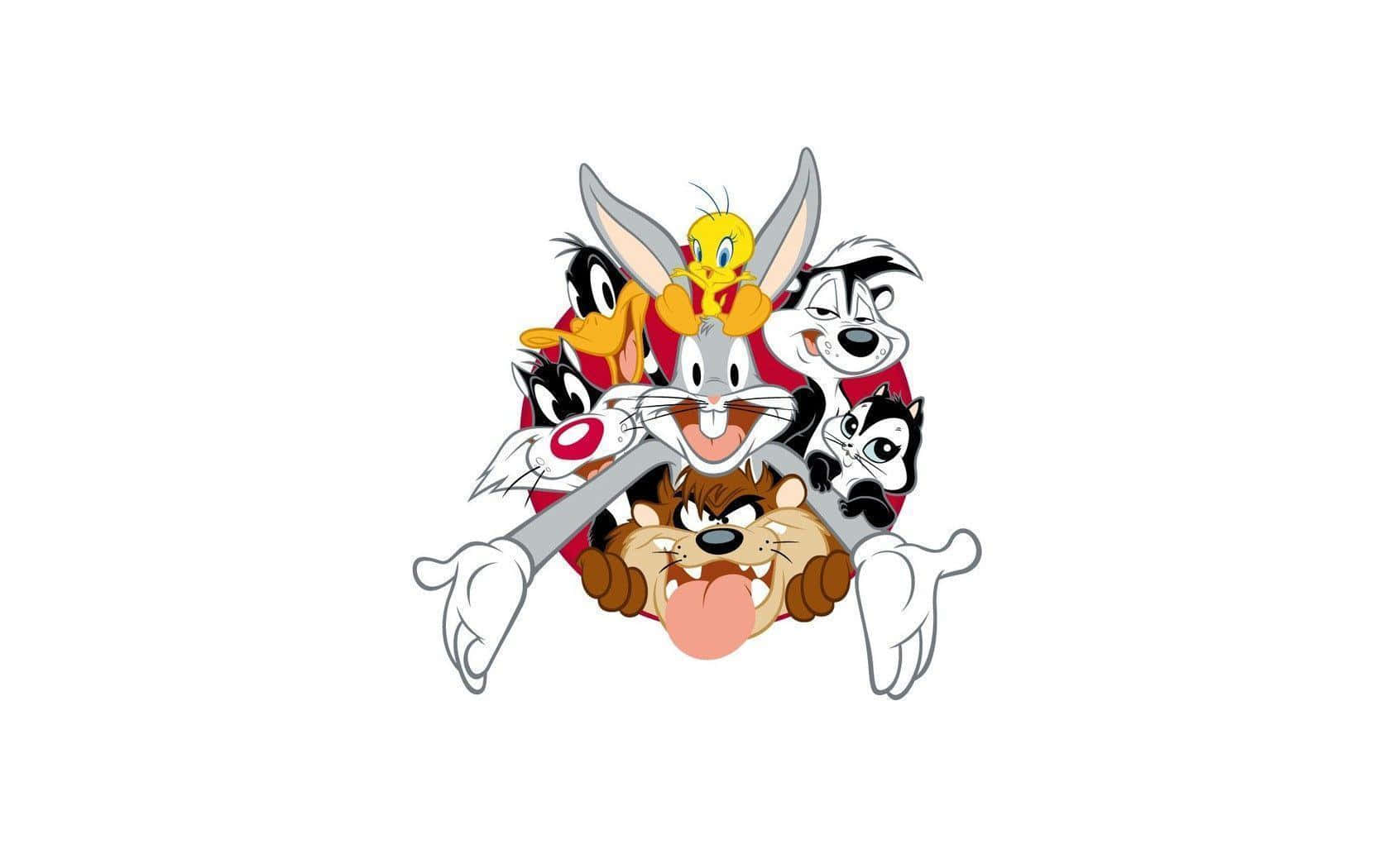 樂一通 桌布 壁紙 — 經典Looney Tunes角色如賓尼兔和翠兒鳥在色彩繽紛的群體肖像中愉快地擺姿勢。