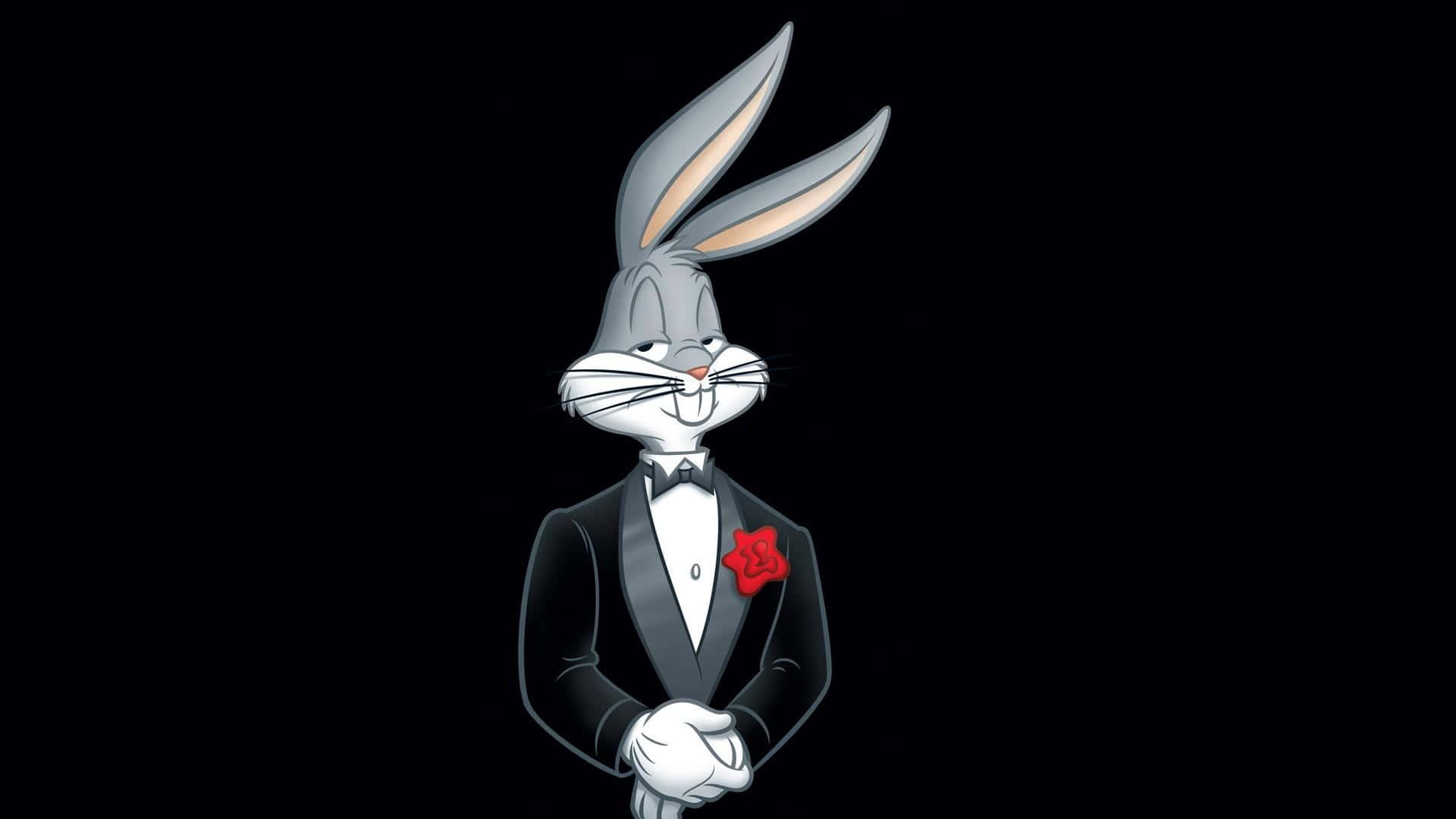 兔巴哥 桌布 壁紙 — 經典卡通兔巴哥身穿燕尾服，手持紅玫瑰，站在黑色背景前。