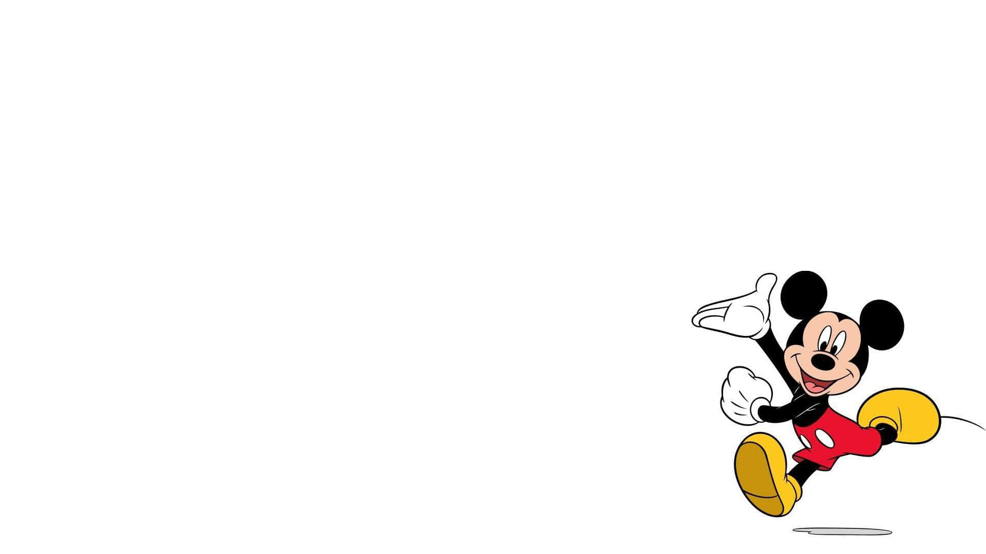 Mickey Mouse Desktop 桌布 壁紙 — 經典卡通米奇老鼠穿著紅色短褲和黃色鞋子，在純白色背景上愉快地揮手。