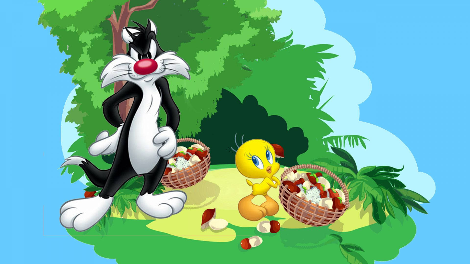 Sylvester 桌布 壁紙 — 經典卡通貓和鳥在明亮的綠色草坪上，在樹下分享裝有食物的籃子進行野餐。