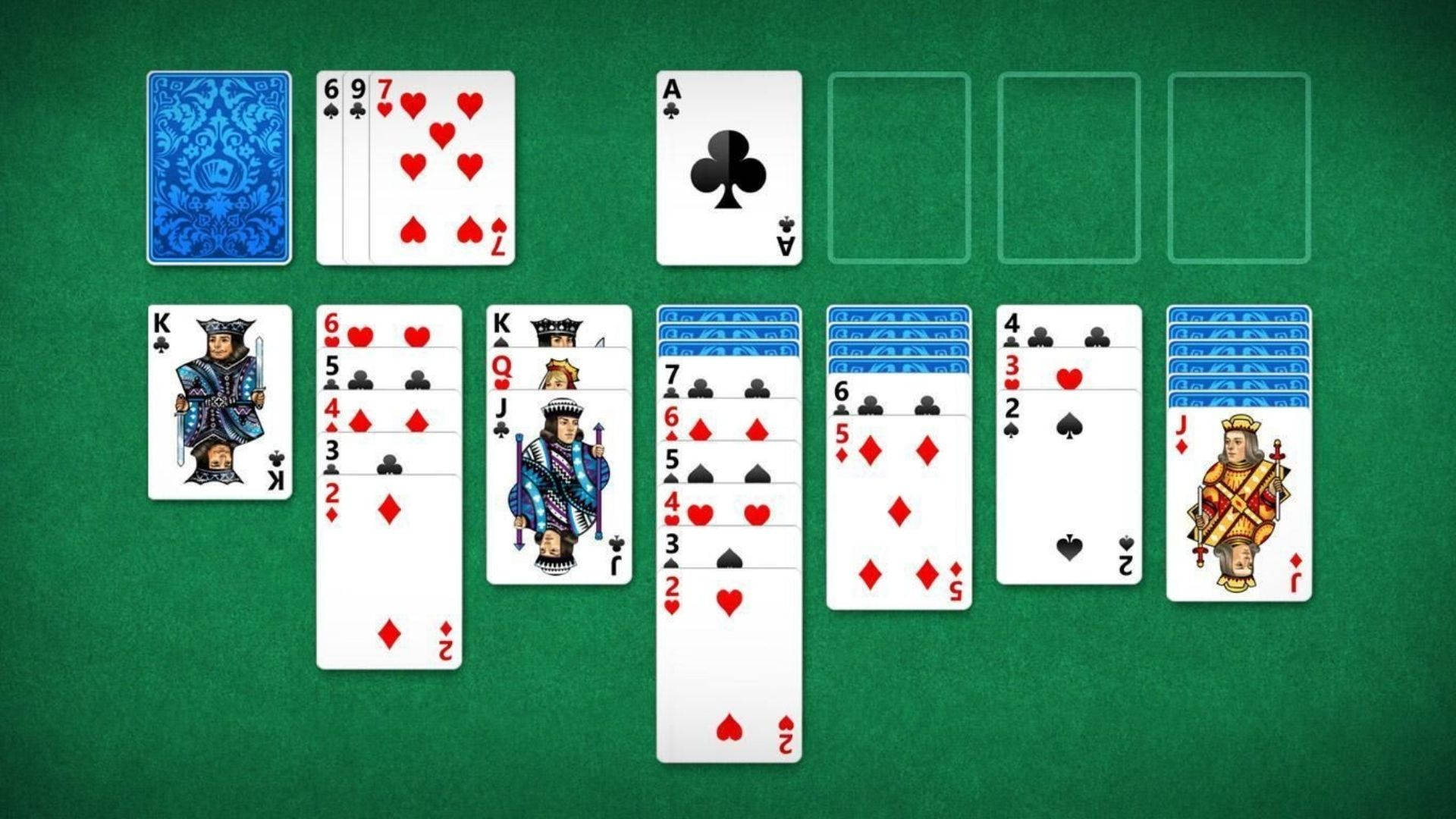在綠色氈桌上進行的接龍紙牌遊戲。 — Microsoft 壁紙