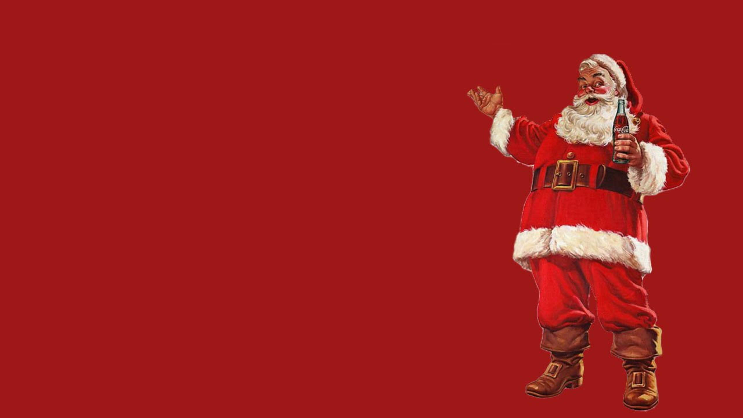 Santa 桌布 壁紙 — 經典插畫聖誕老人穿著紅色西裝，手持可口可樂瓶，背景為純紅色。
