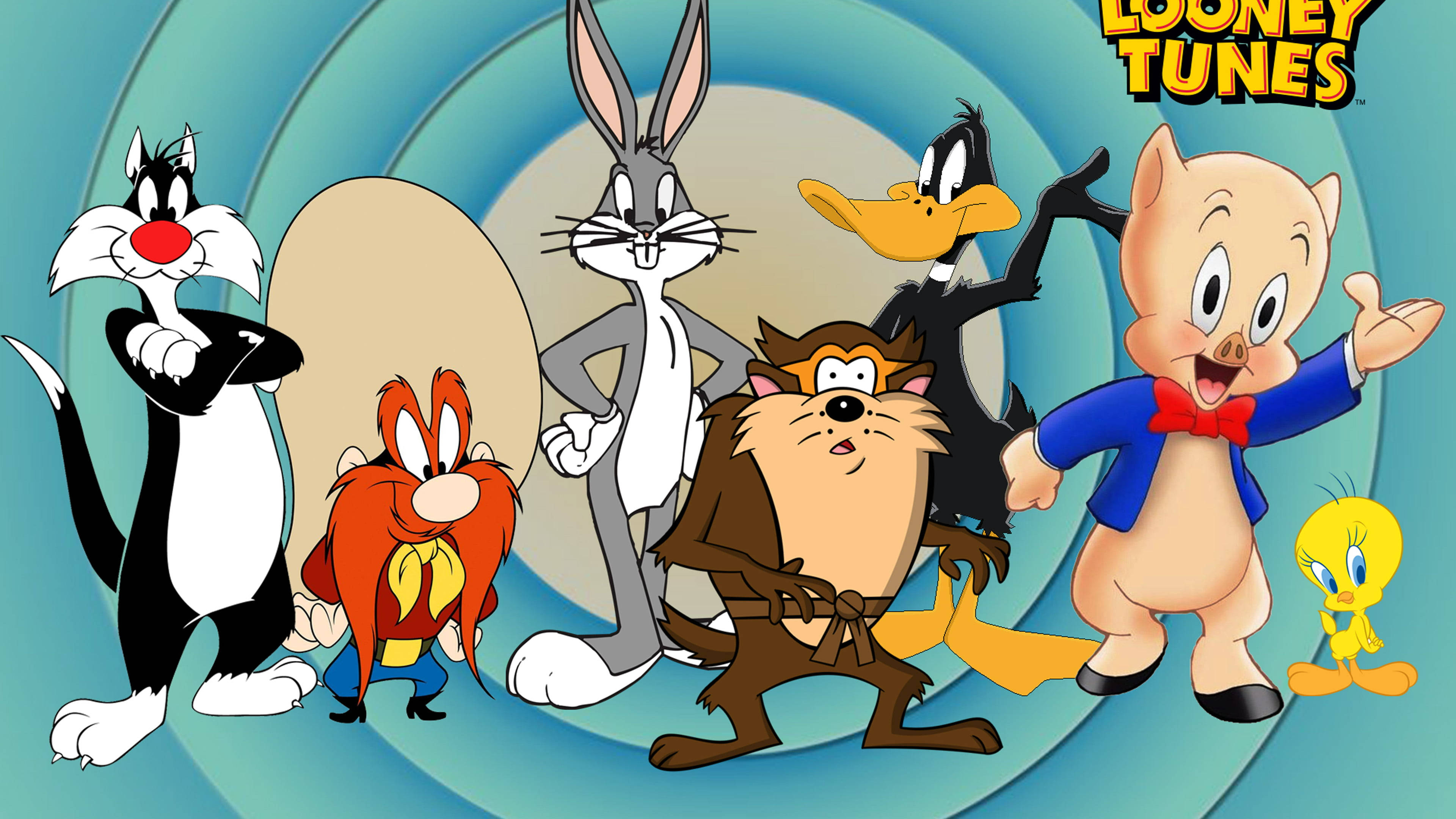 Yosemite Sam 桌布 壁紙 — 經典樂一通角色在旋轉的藍色靶心背景前愉快地擺姿勢。