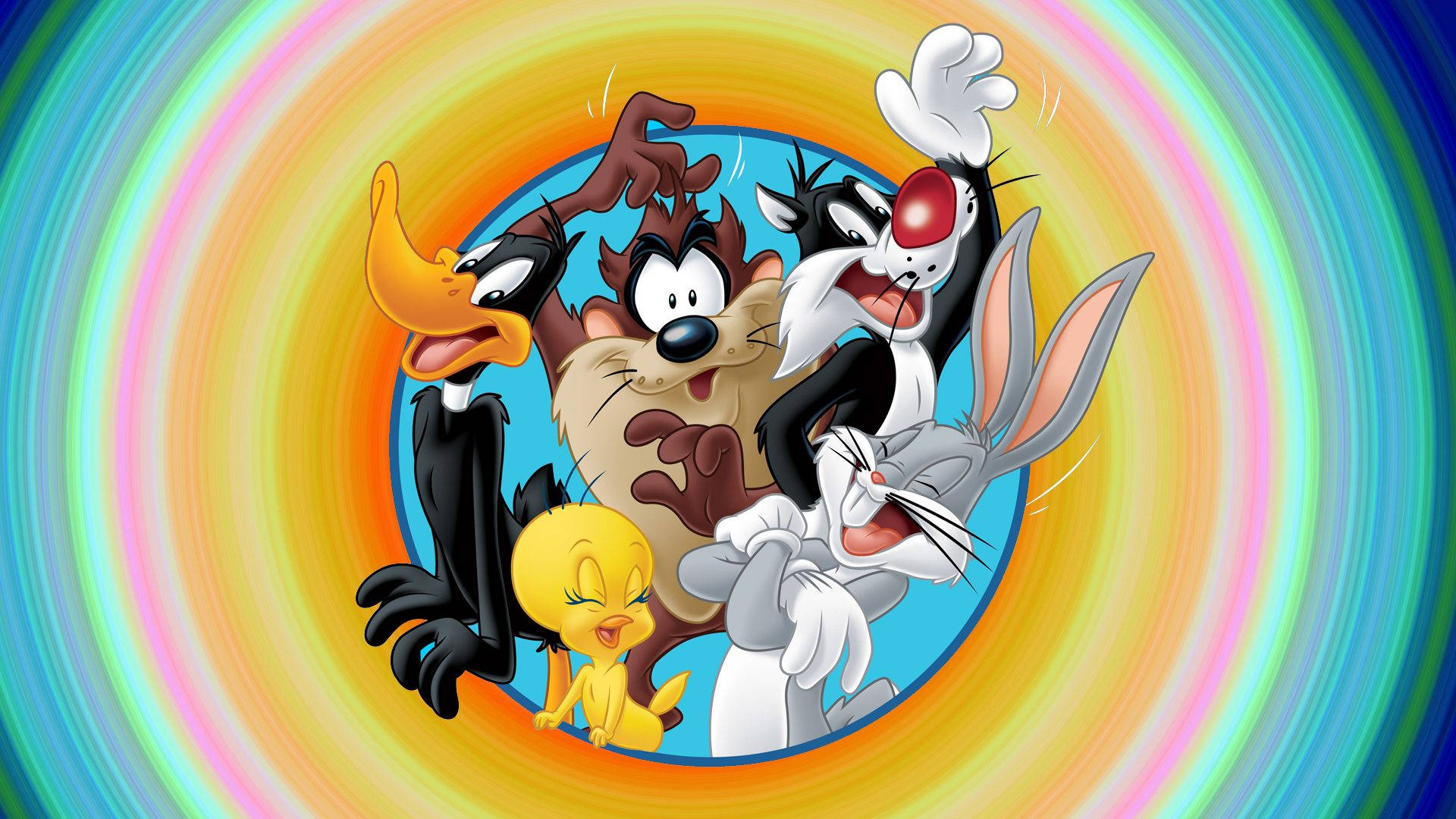 Sylvester 桌布 壁紙 — 經典樂一通角色從旋轉的彩虹漩渦中迸發出來，形成一場充滿活力的卡通爆炸。
