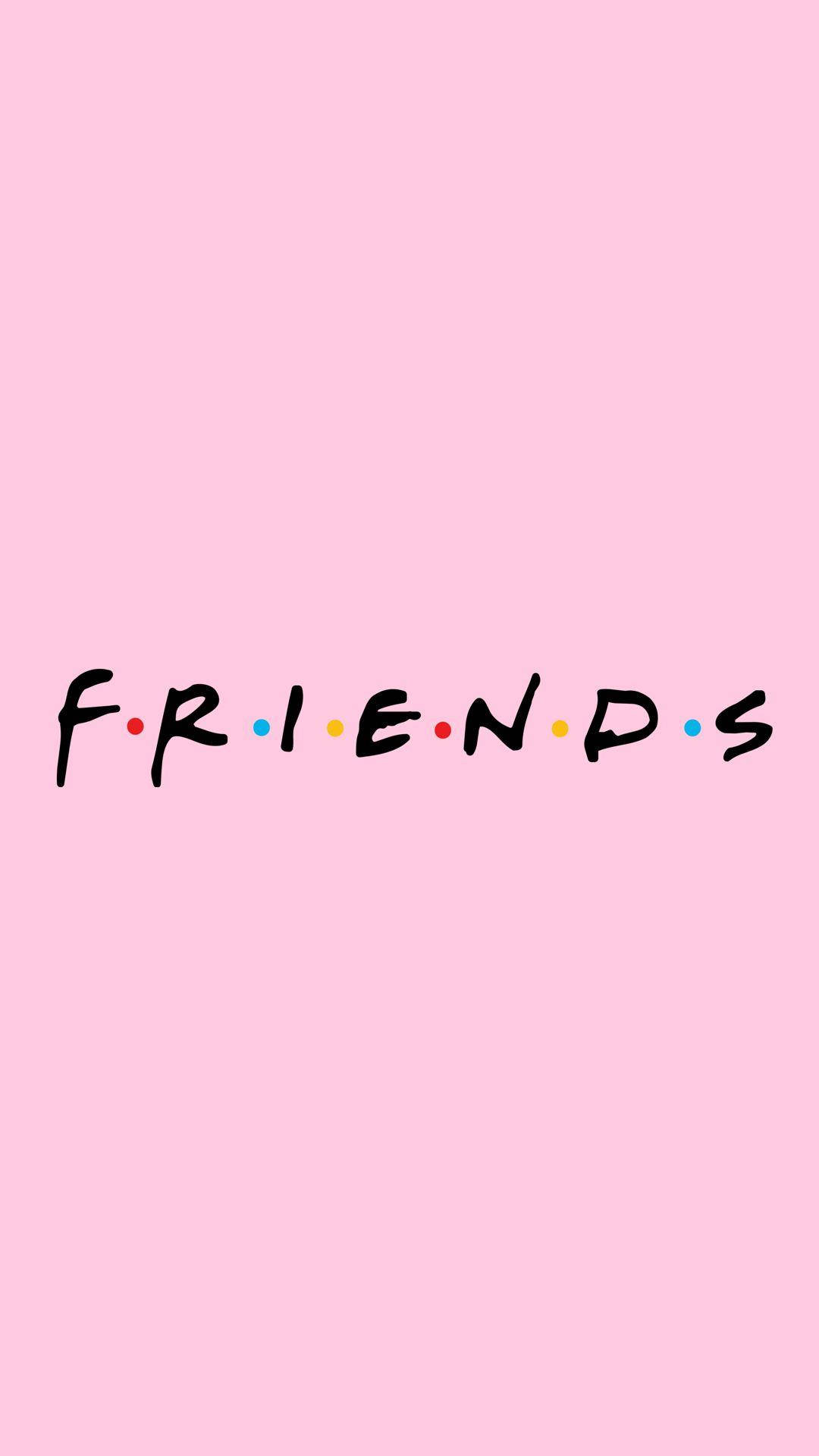 粉嫩美學 iPhone 桌布 壁紙 — 經典的「FRIENDS」標誌，以黑色手寫字體呈現，並在純粉紅色背景上綴有彩色圓點。