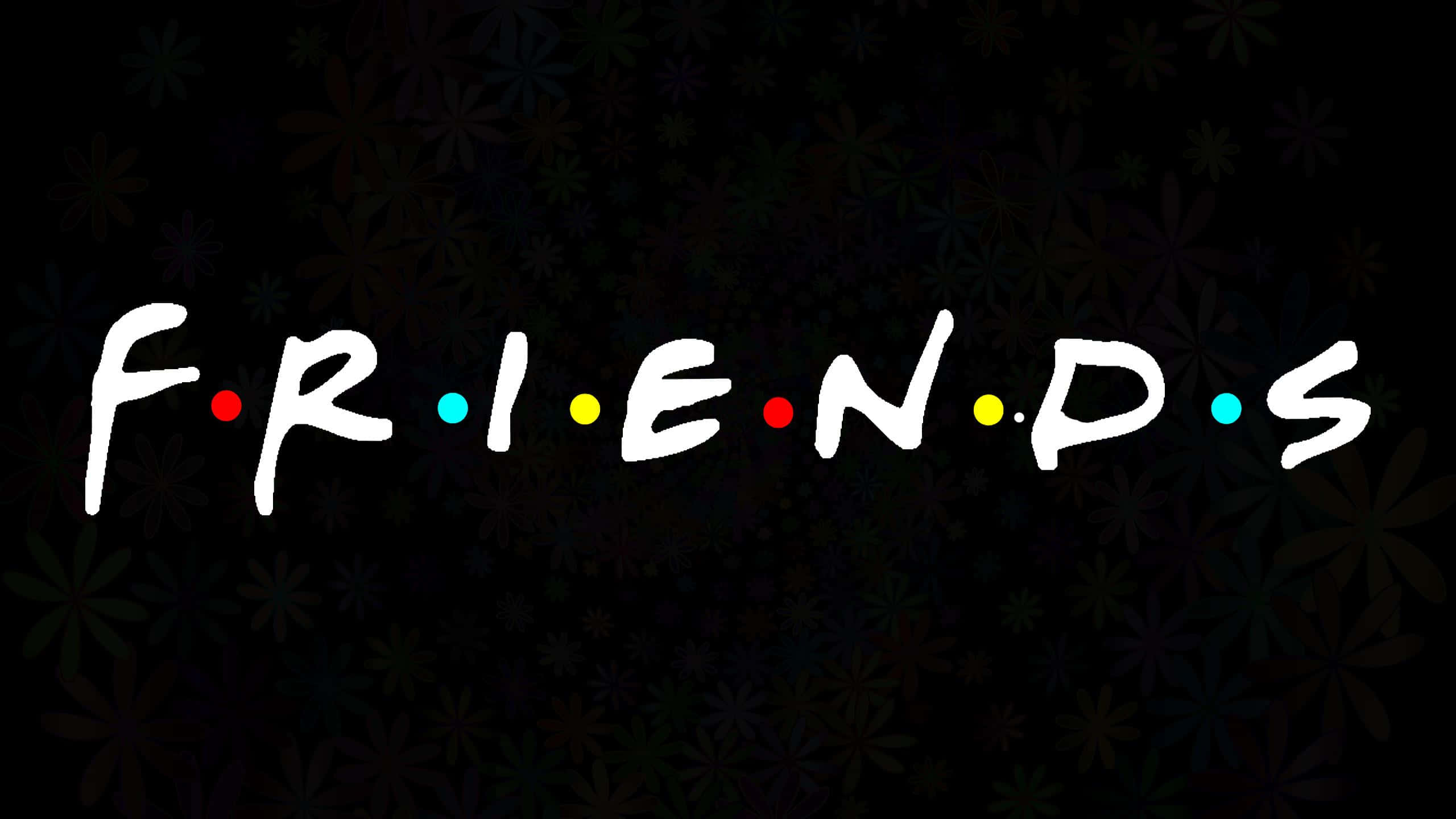 老友記 桌布 壁紙 — 經典的「Friends」標誌，白色手寫字體配上彩色圓點，在深色花卉圖案背景上。