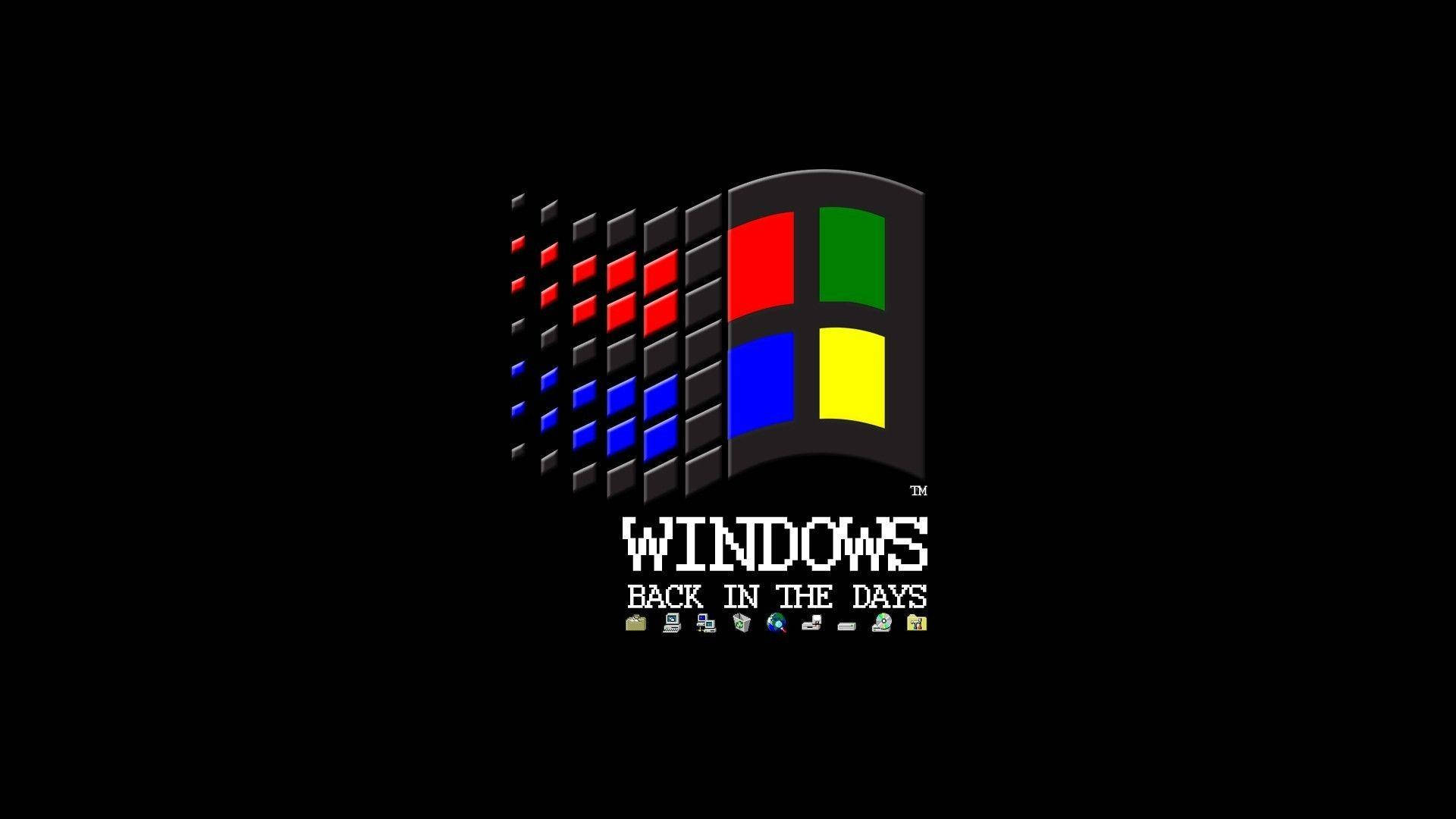 Windows 98 桌布 壁紙 — 經典的Windows標誌，帶有像素化的復古文字和圖標，黑色背景，喚起懷舊的運算體驗。