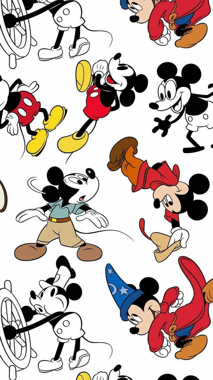 Mickey 桌布 壁紙 — 經典米奇老鼠以各種俏皮姿勢和服裝散落在白色背景上。