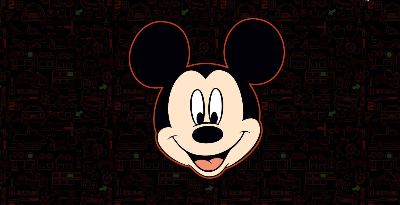Mickey Mouse Desktop 桌布 壁紙 — 經典米奇老鼠臉孔在充滿模糊迪士尼主題圖示的深色背景上明亮地微笑。