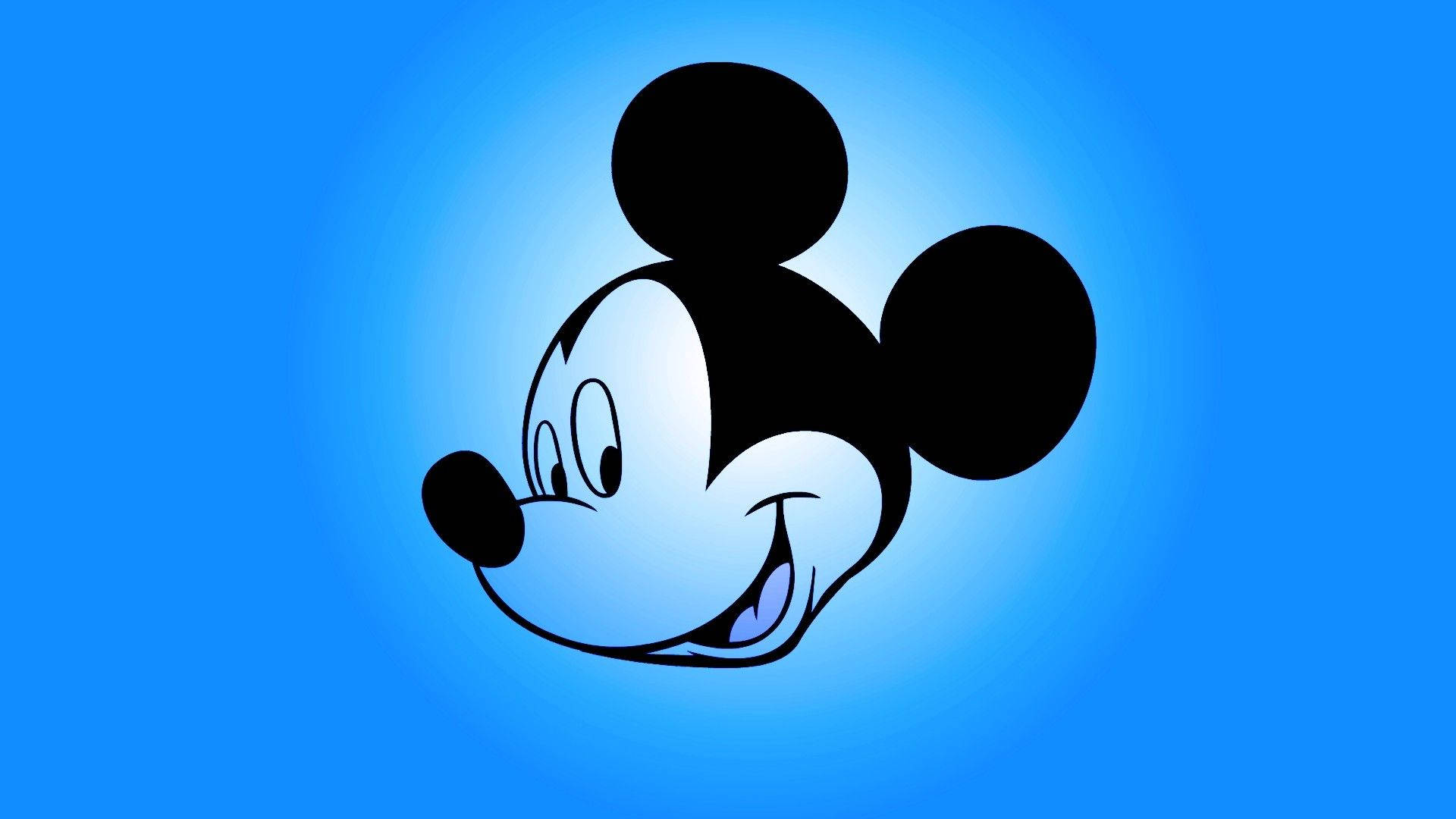 Mickey 桌布 壁紙 — 經典米奇老鼠頭部剪影在充滿活力的藍色漸變背景上燦爛微笑。