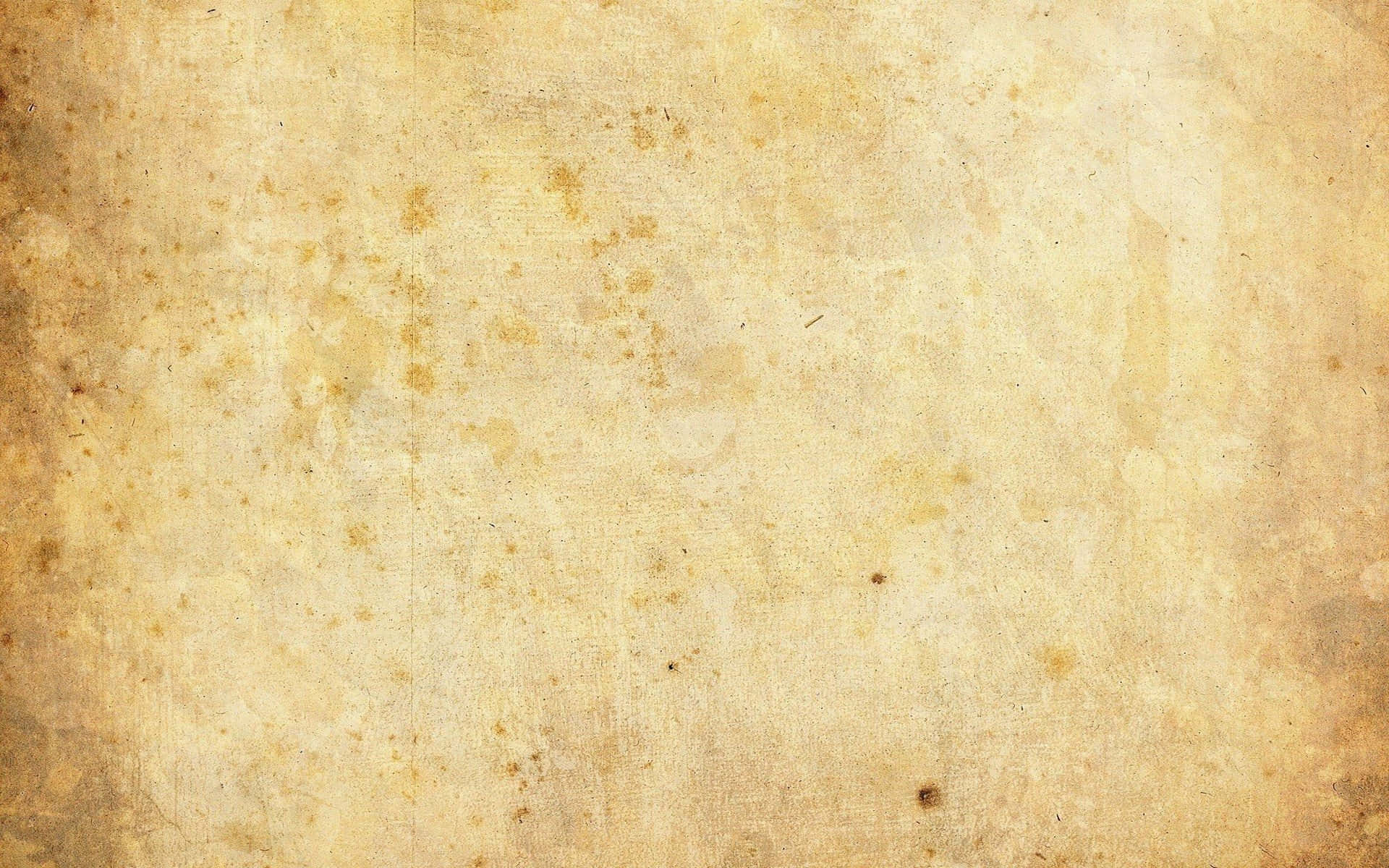 Brown Paper 桌布 壁紙 — 經風化的米色羊皮紙，帶有細微污漬和紋理，喚起陳舊復古紙張的感覺。