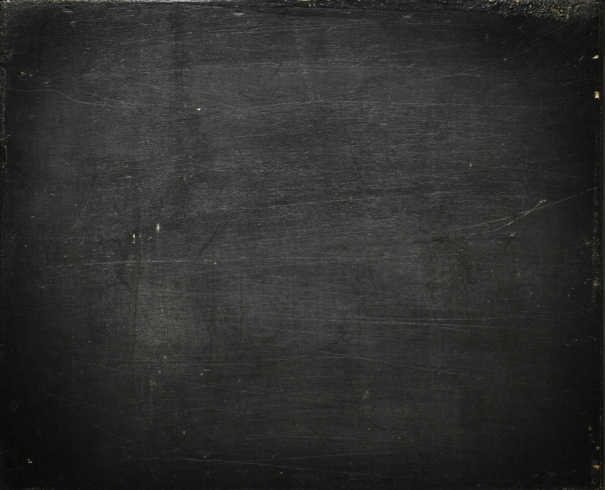 Chalkboard 桌布 壁紙 — 經風化的黑色黑板表面，帶有輕微刮痕和污跡，營造出復古紋理背景。