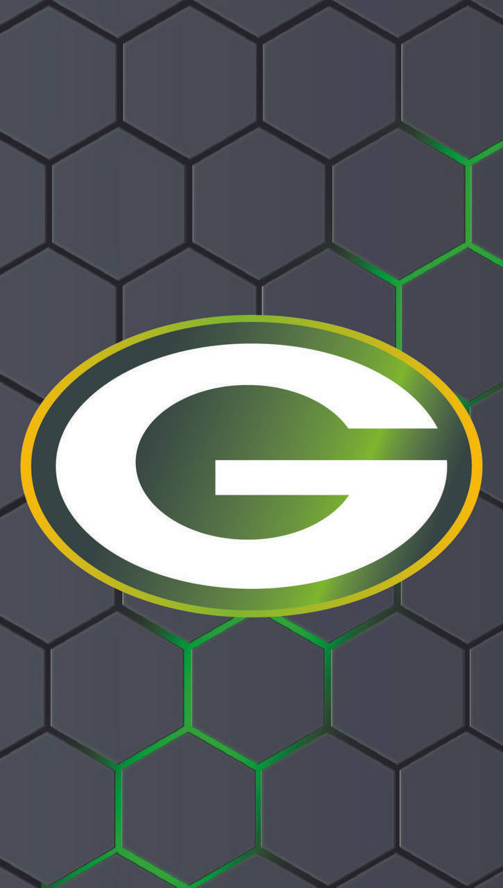Packers 桌布 壁紙 — 綠灣包裝工隊標誌居中放置在深色六邊形網格上，帶有發光的綠色點綴。