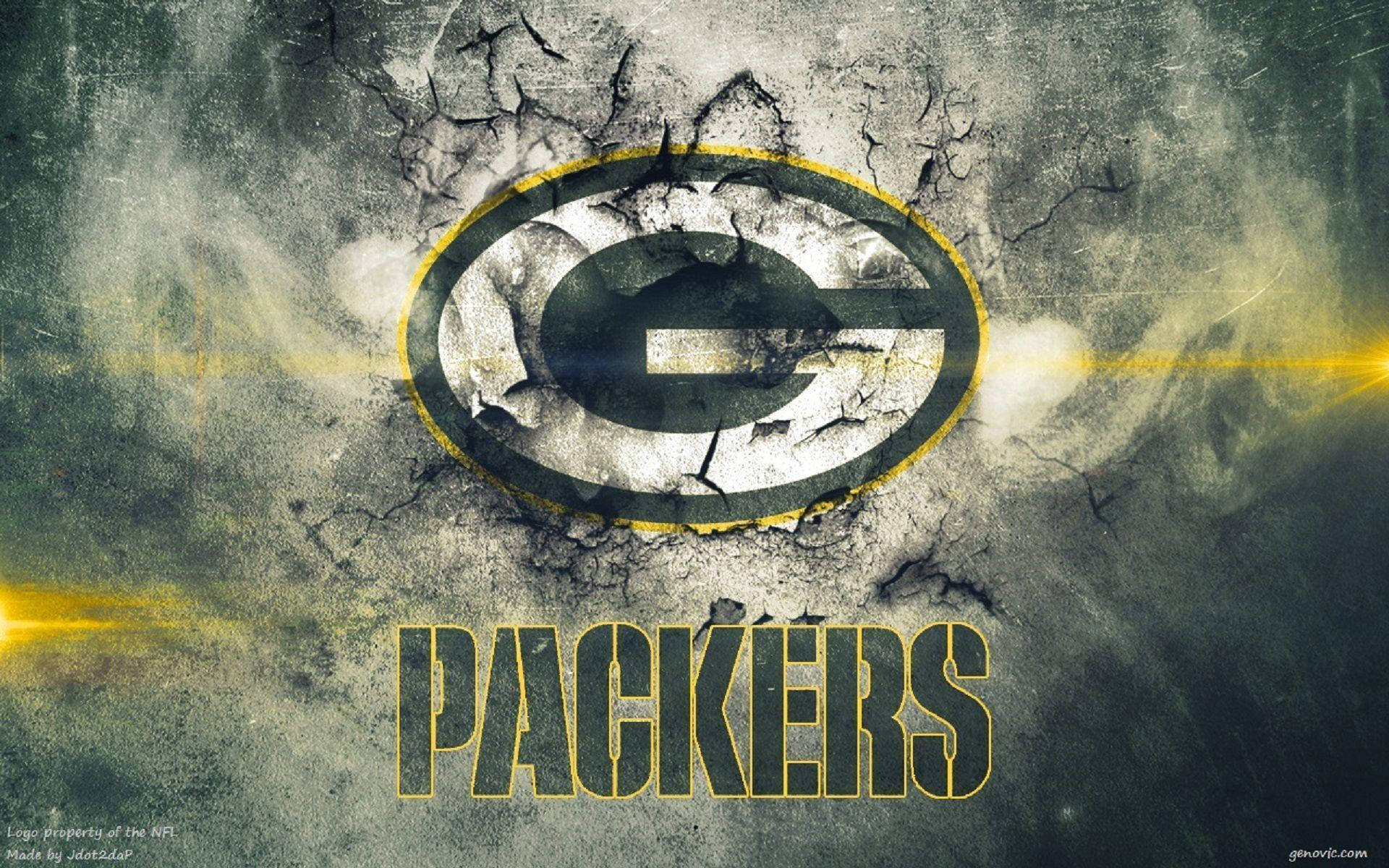 Packers 桌布 壁紙 — 綠灣包裝工隊標誌穿過裂縫混凝土，帶有黃色鏡頭光暈，背景粗糙有紋理。