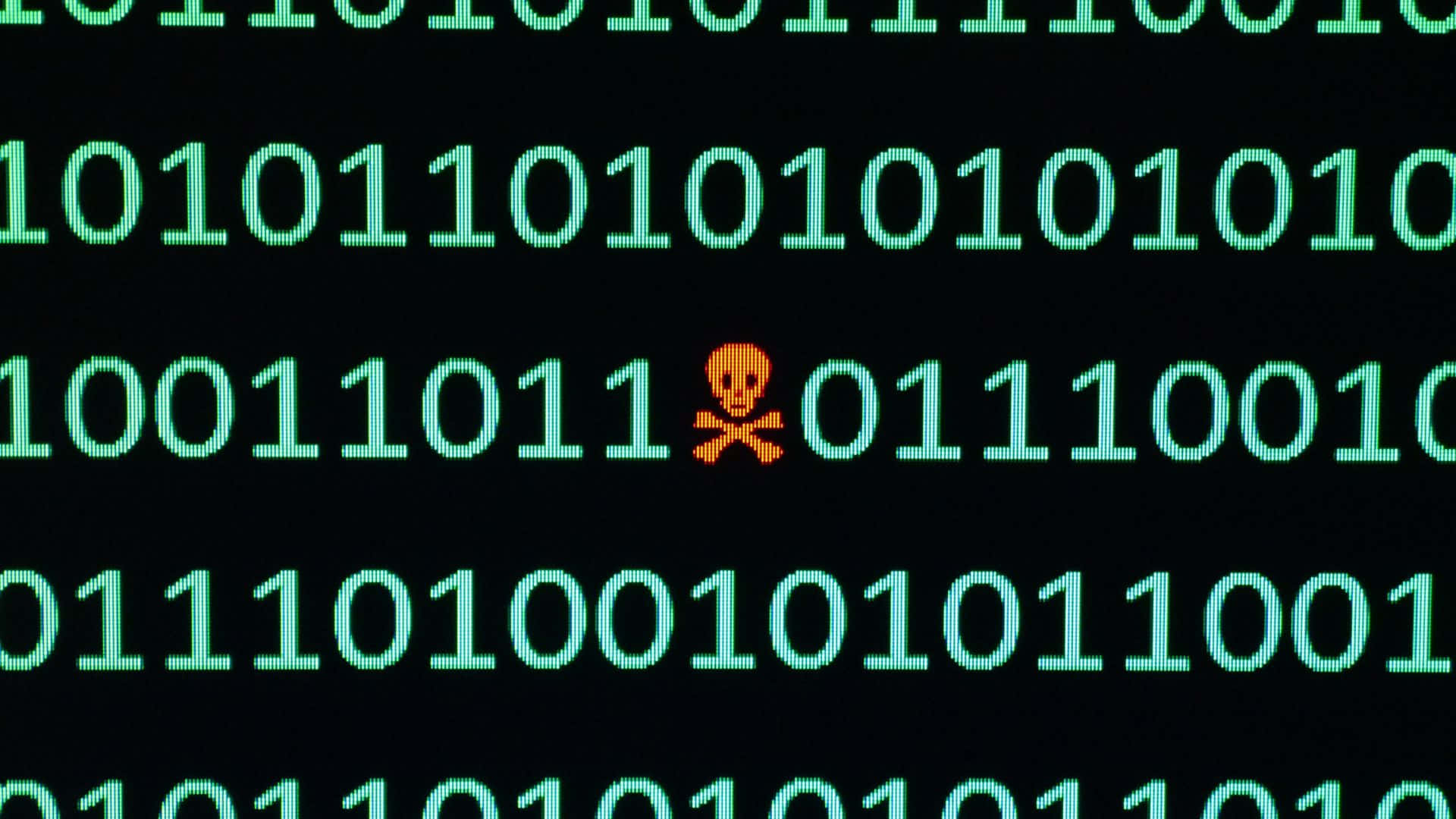 Code 桌布 壁紙 — 綠色二進制代碼在黑色屏幕上滾動，流中嵌入了一個發光的橙色骷髏和交叉骨符號。