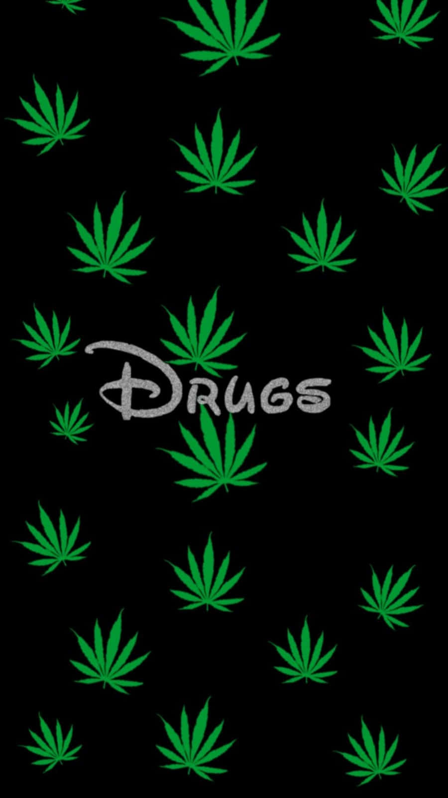 桌布 壁紙 — 綠色大麻葉散落在黑色背景上，帶有迪士尼風格的「drugs」字樣。