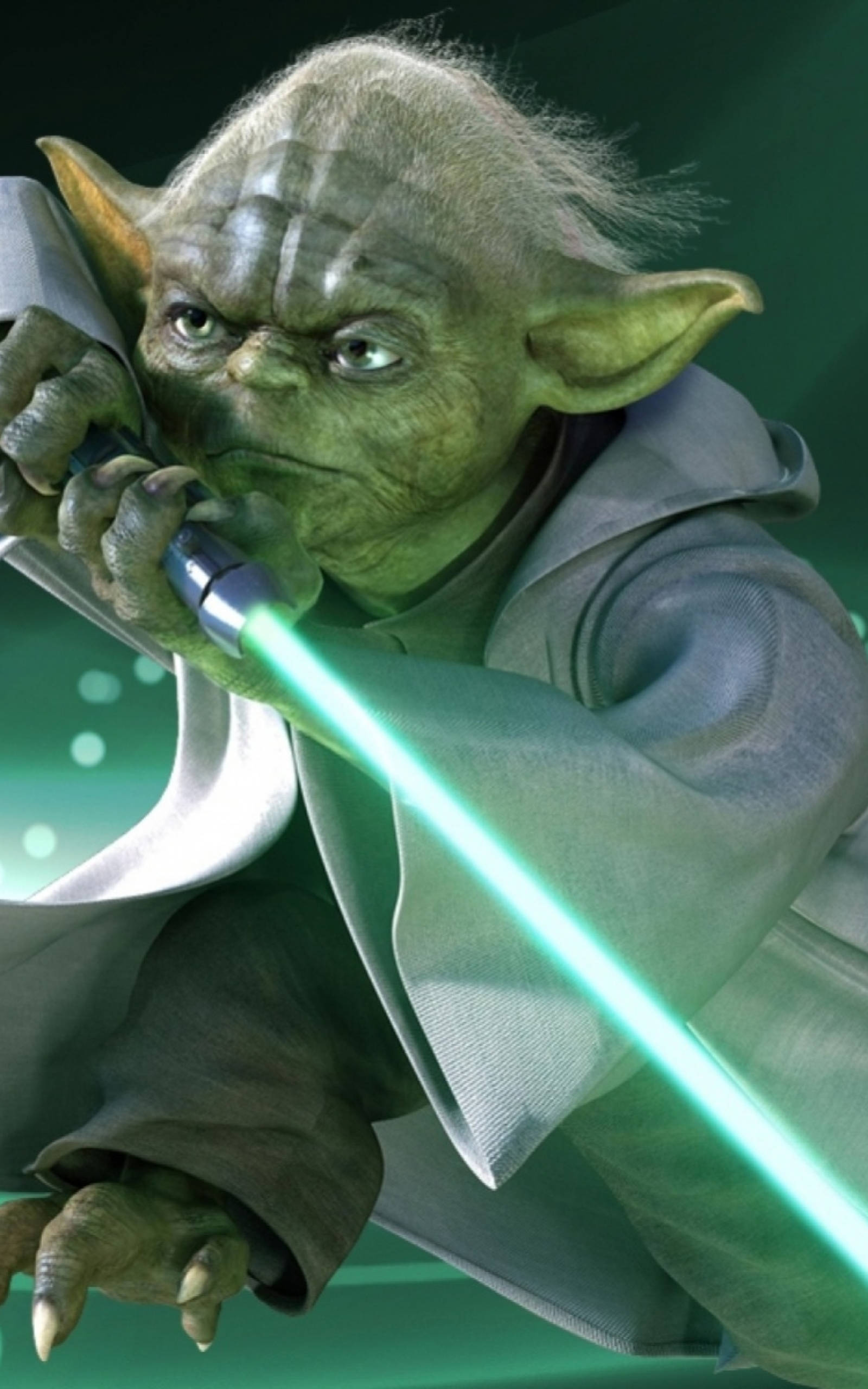 Yoda 桌布 壁紙 — 綠色絕地大師尤達在深綠色背景下，專注地握著發光的綠色光劍。