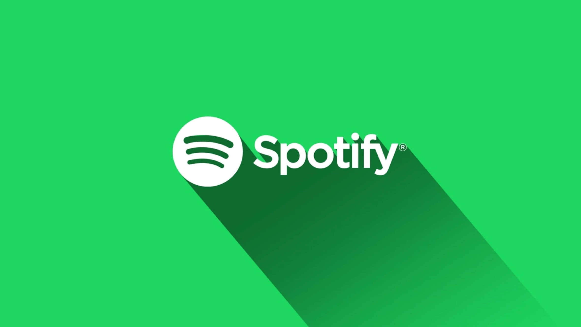 綠色背景上的Spotify標誌 壁紙