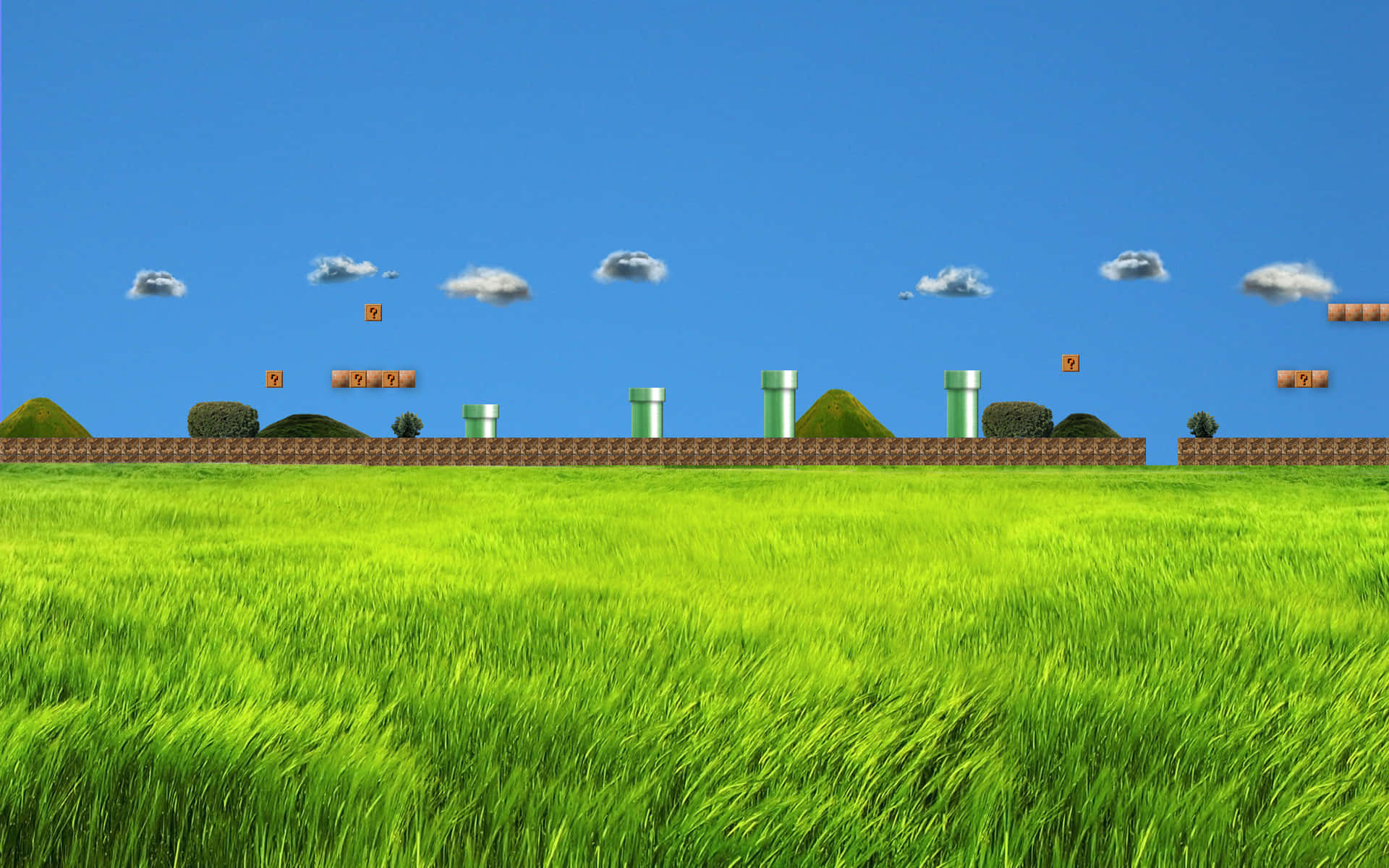 綠色草地與雲朵的風景 壁紙